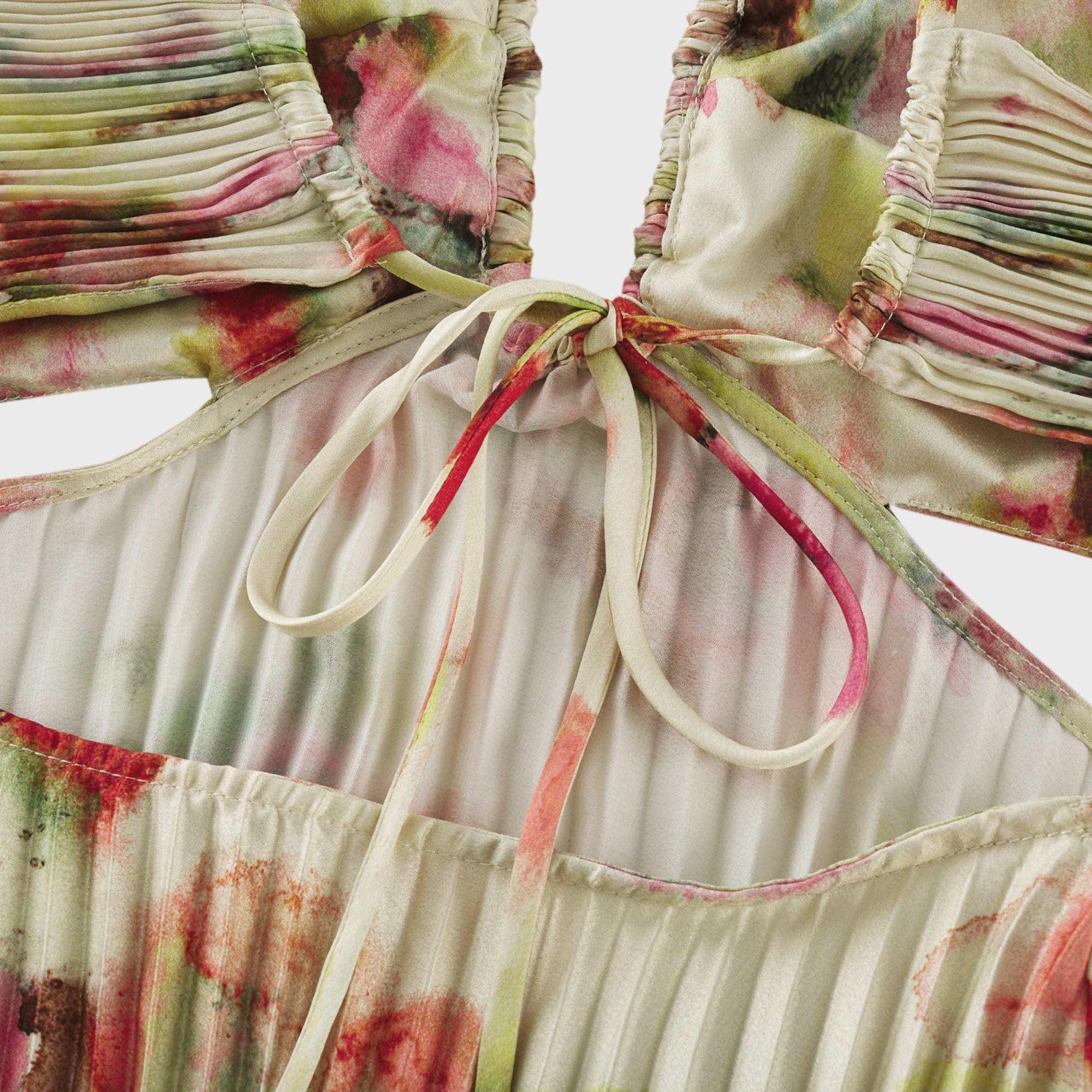 Floral pleated halter gown with side cutouts