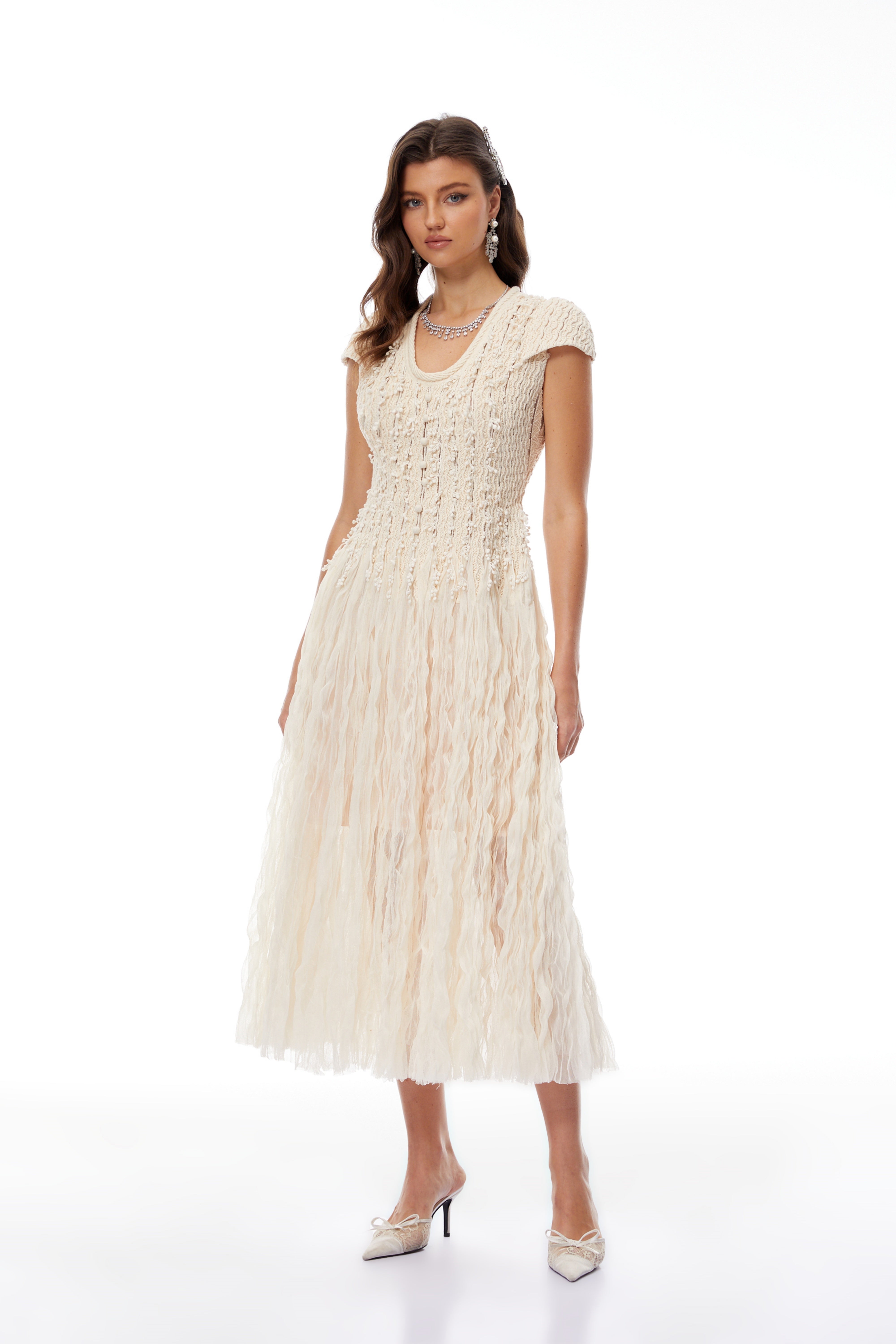 Cream cap-sleeve textured knit midi dress with fringe detailed skirt
