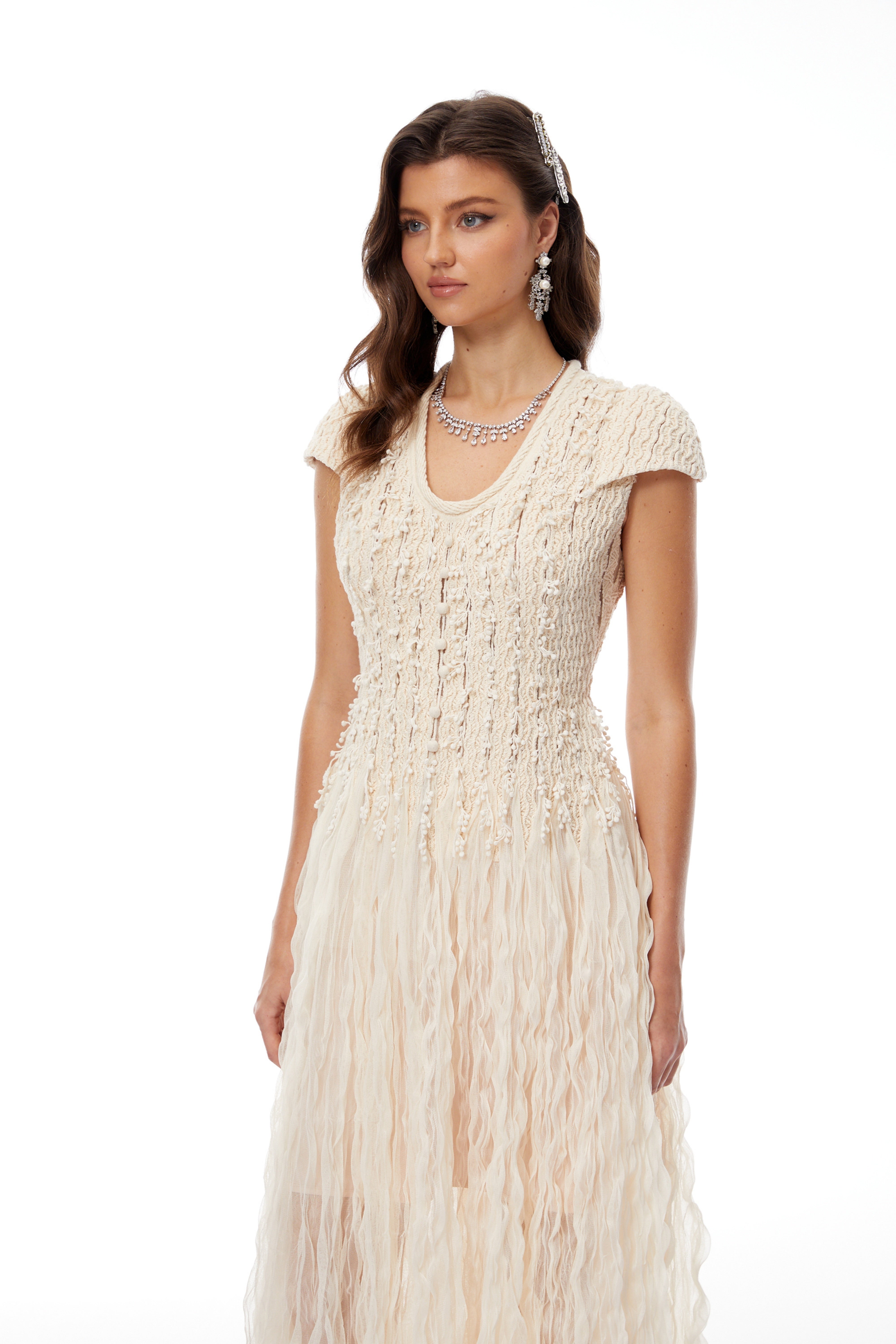 Cream cap-sleeve textured knit midi dress with fringe detailed skirt