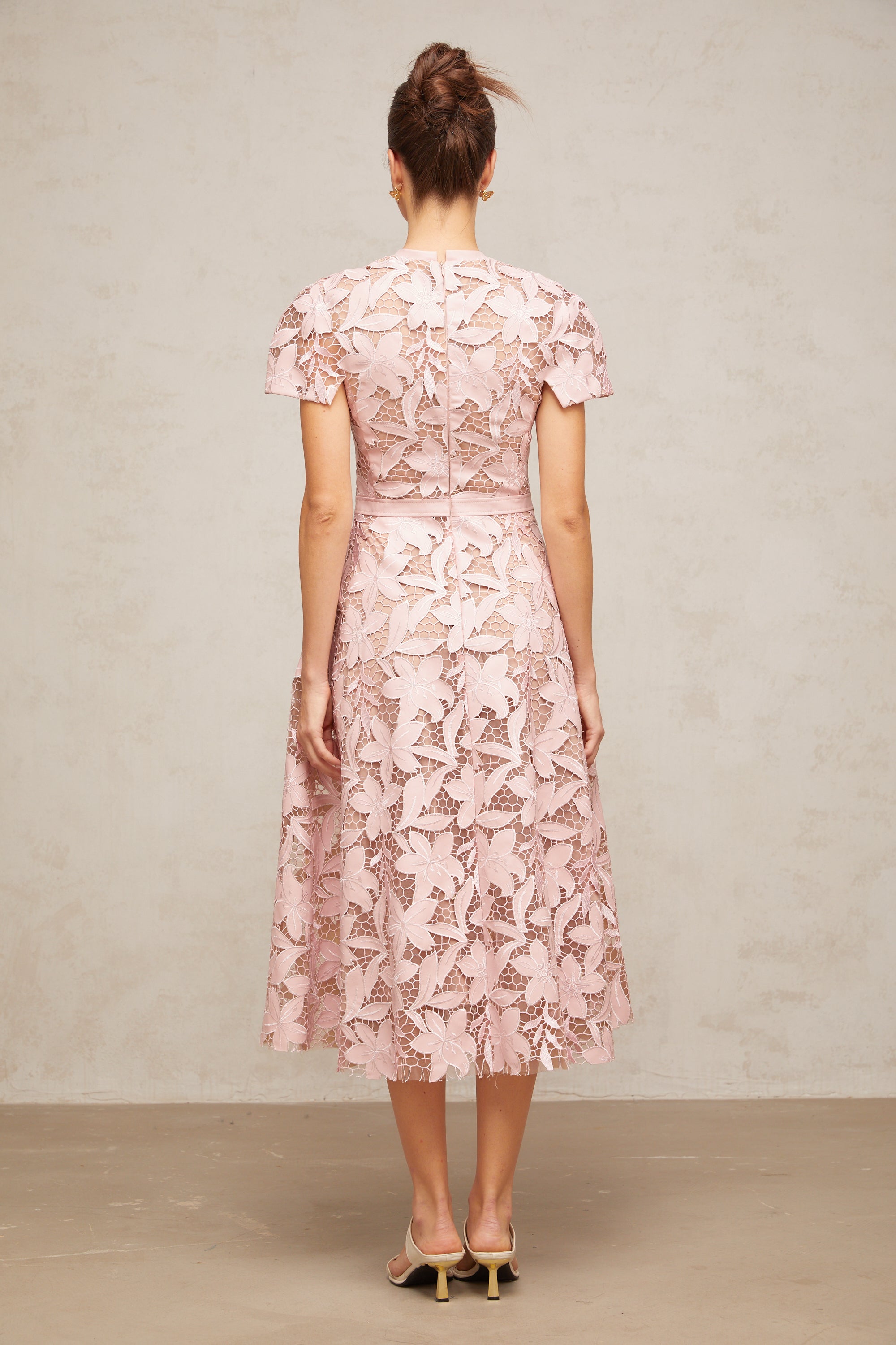 Pink floral laser-cut midi dress with short sleeves and a high neckline
