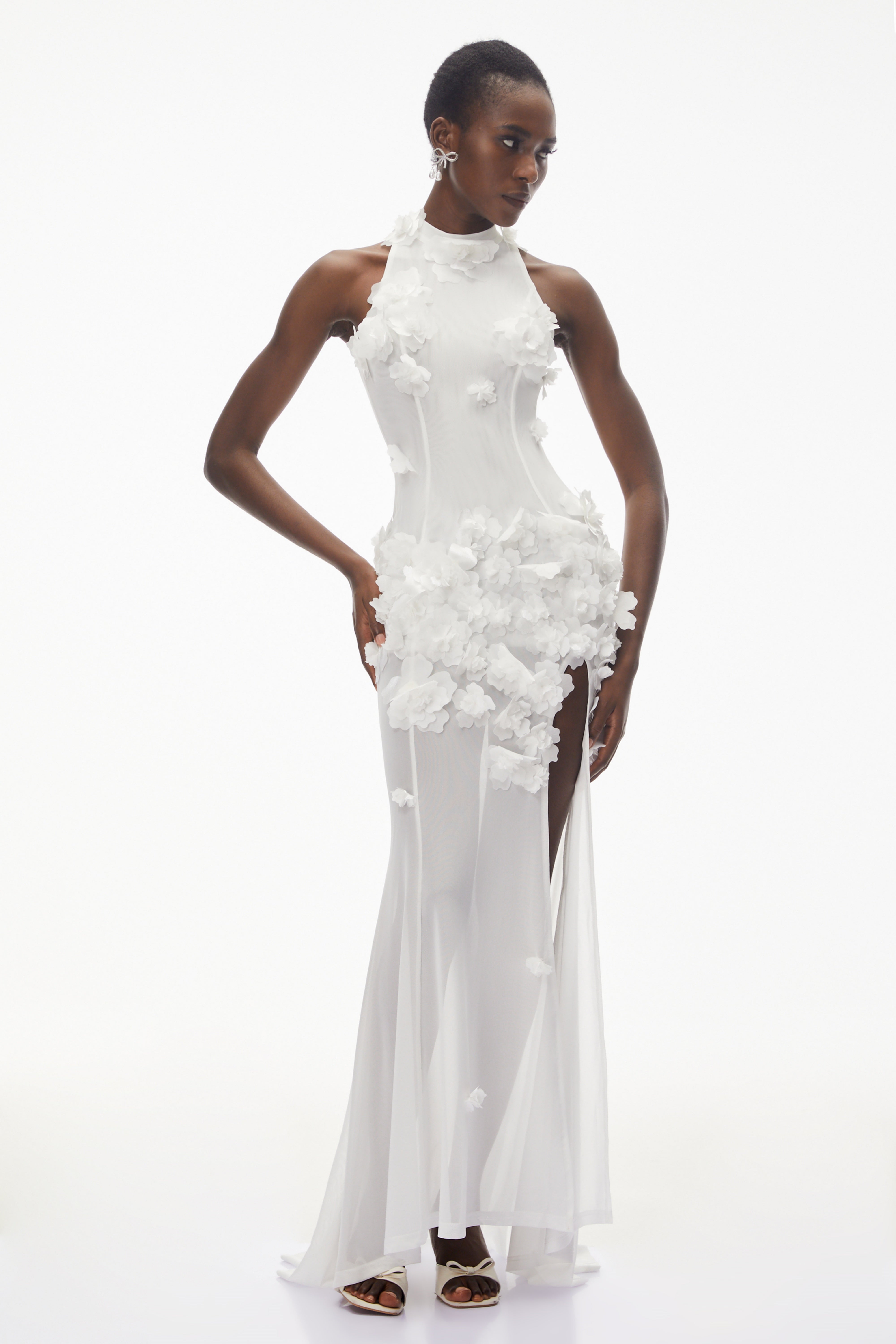 White halter-neck maxi gown with 3D floral appliqué
