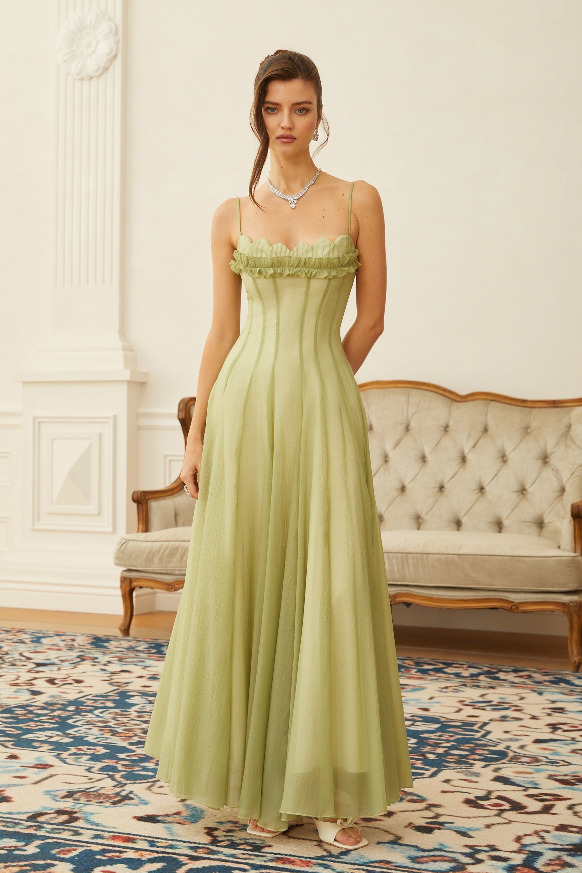Light green spaghetti strap maxi dress with a ruffled neckline