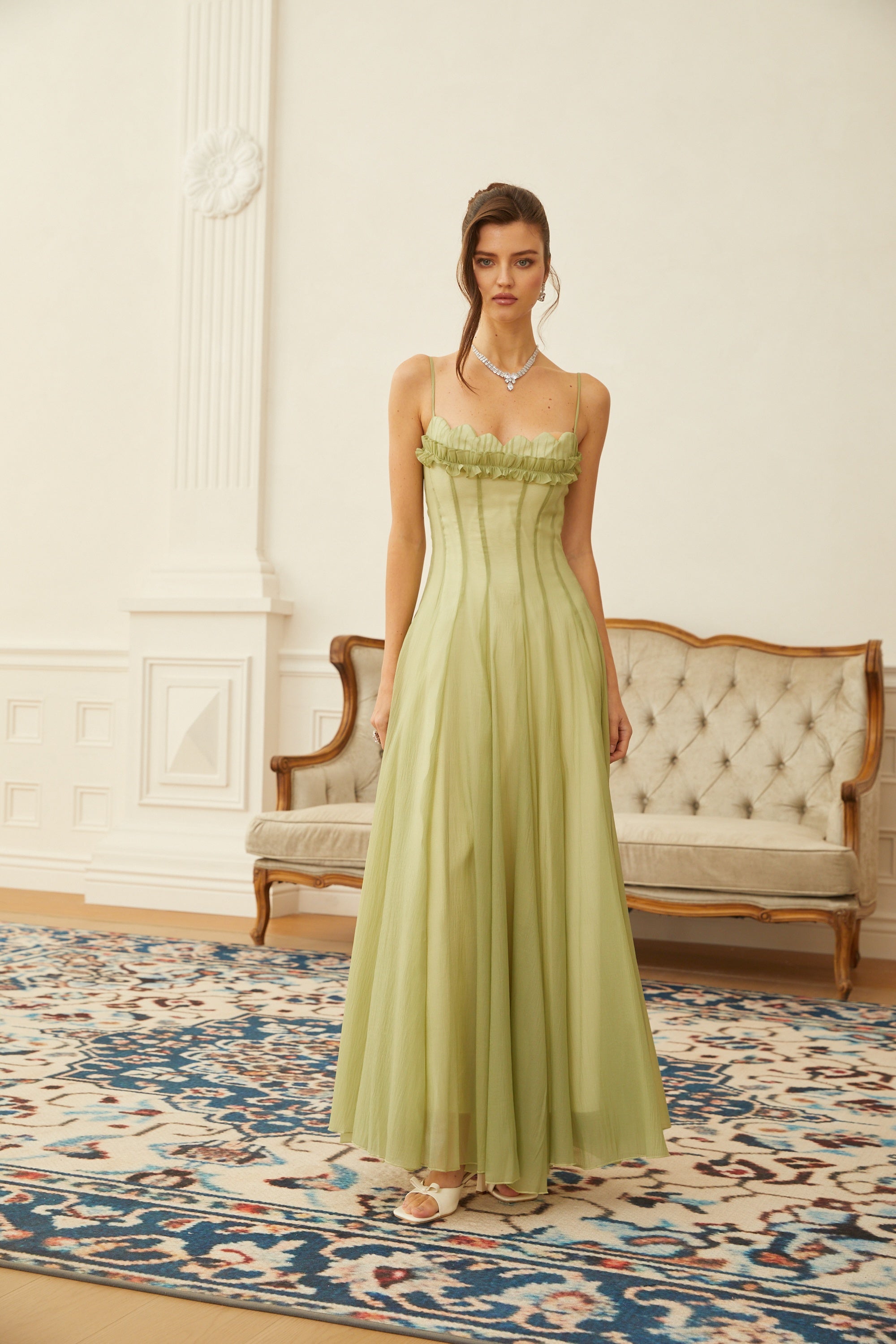 Light green spaghetti strap maxi dress with a ruffled neckline