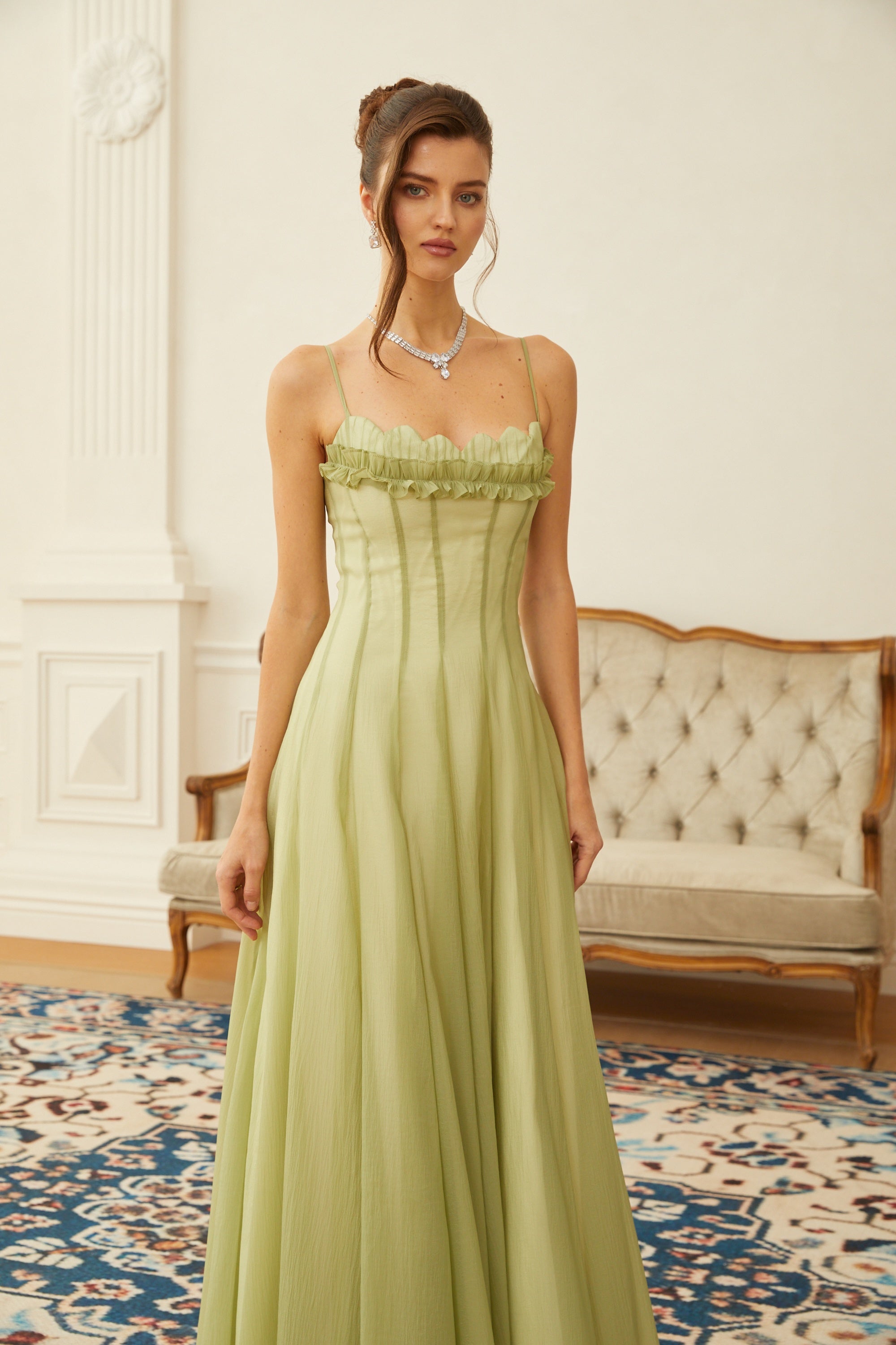 Light green spaghetti strap maxi dress with a ruffled neckline