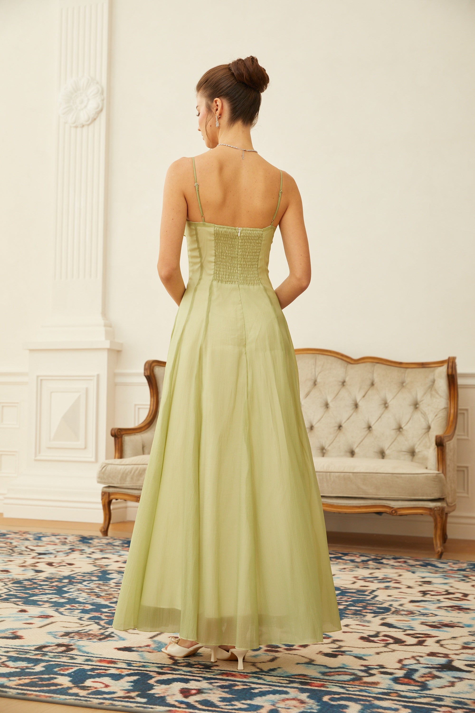 Light green spaghetti strap maxi dress with a ruffled neckline