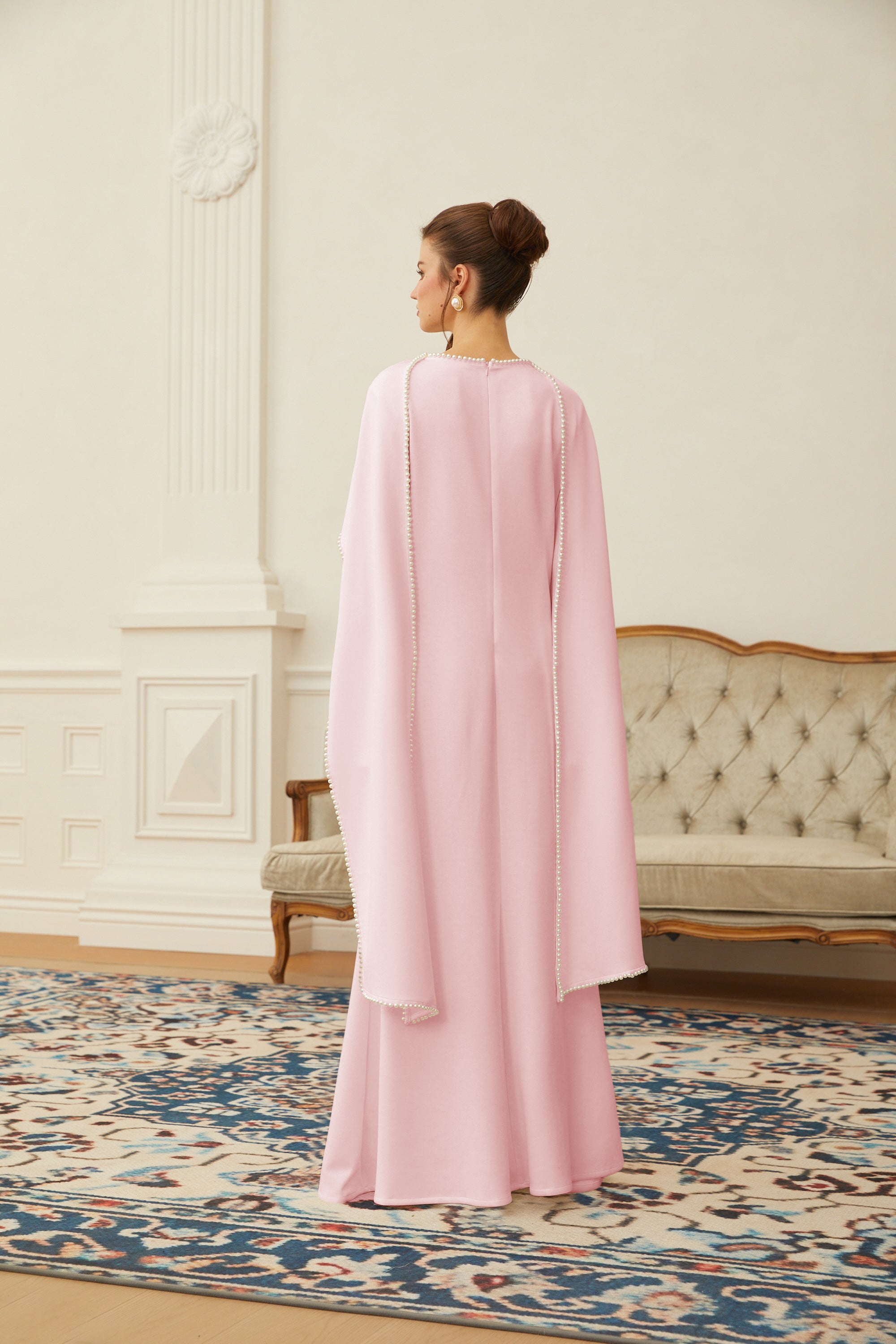 Pale pink long-sleeve maxi dress with a matching beaded cape overlay