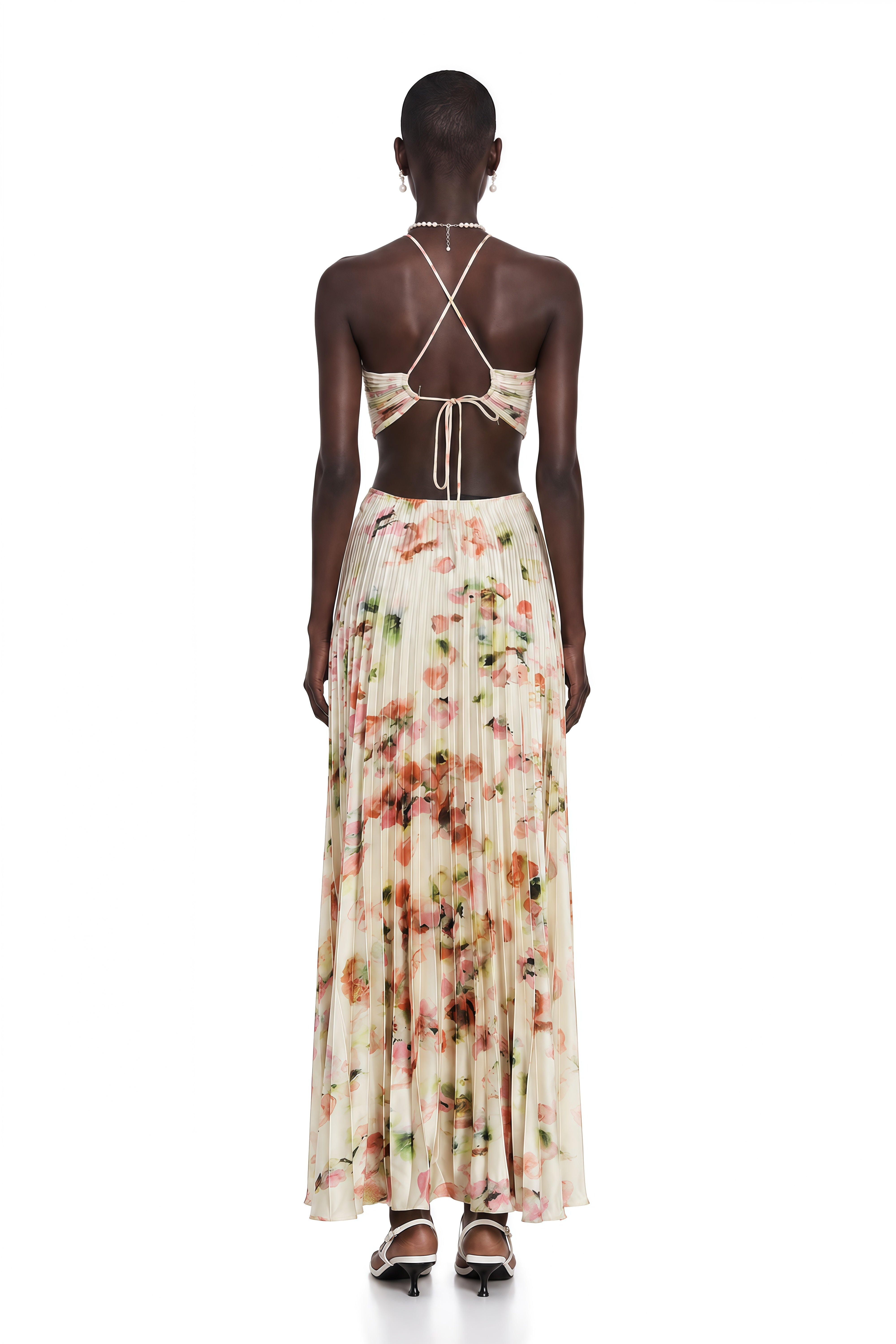 Floral pleated halter gown with side cutouts