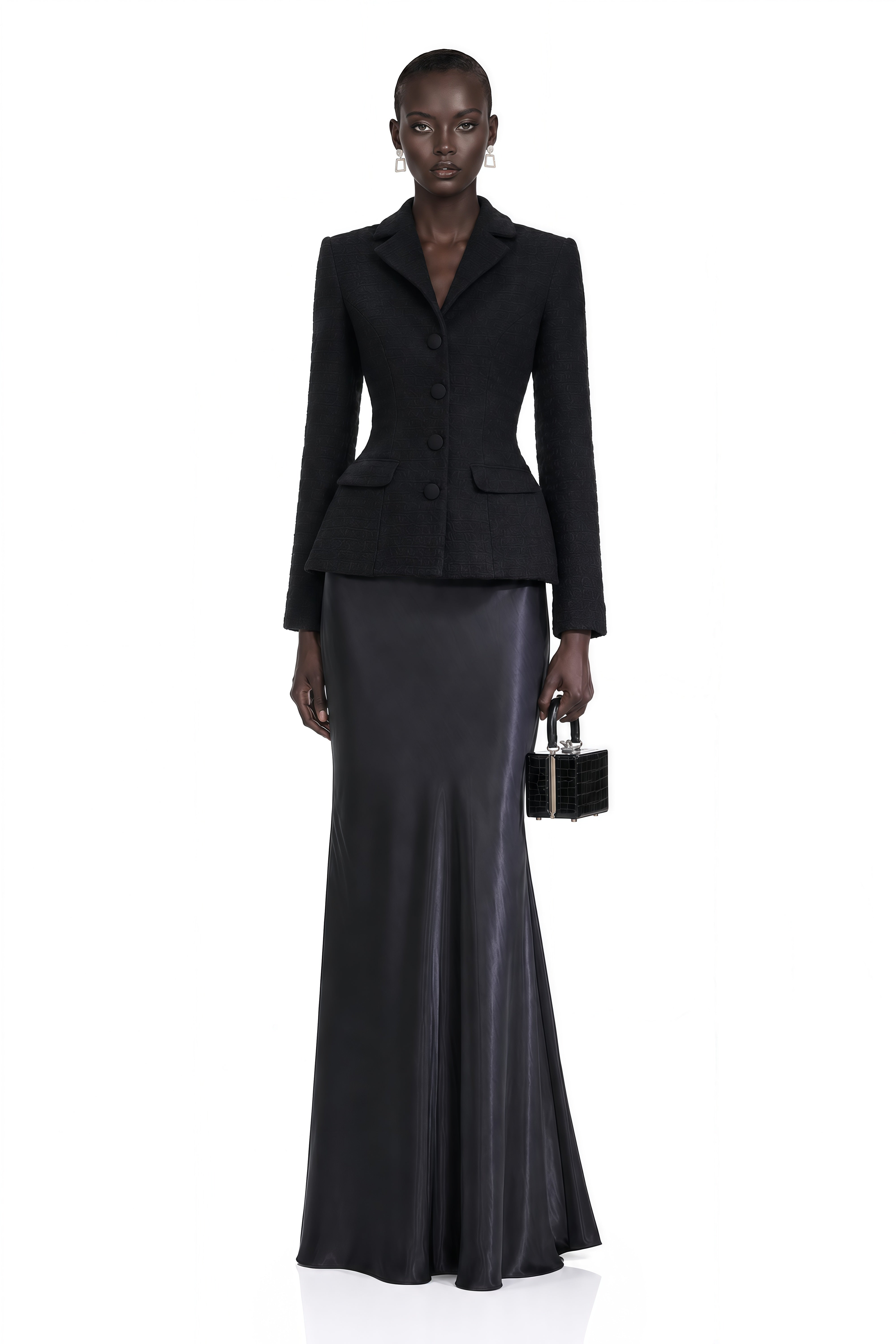 Black blazer paired with a black satin maxi skirt