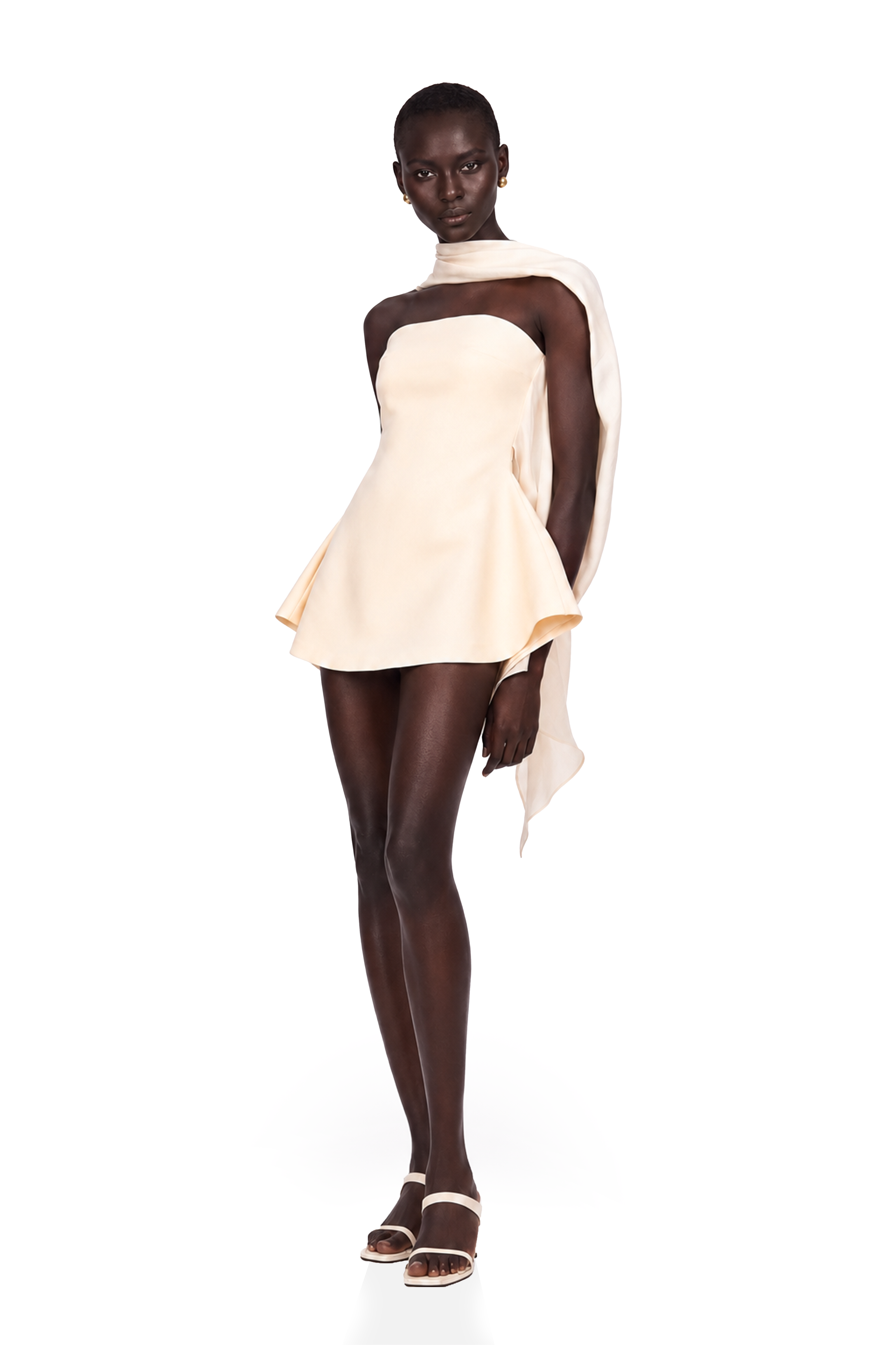 Cream strapless mini dress with a draped cape