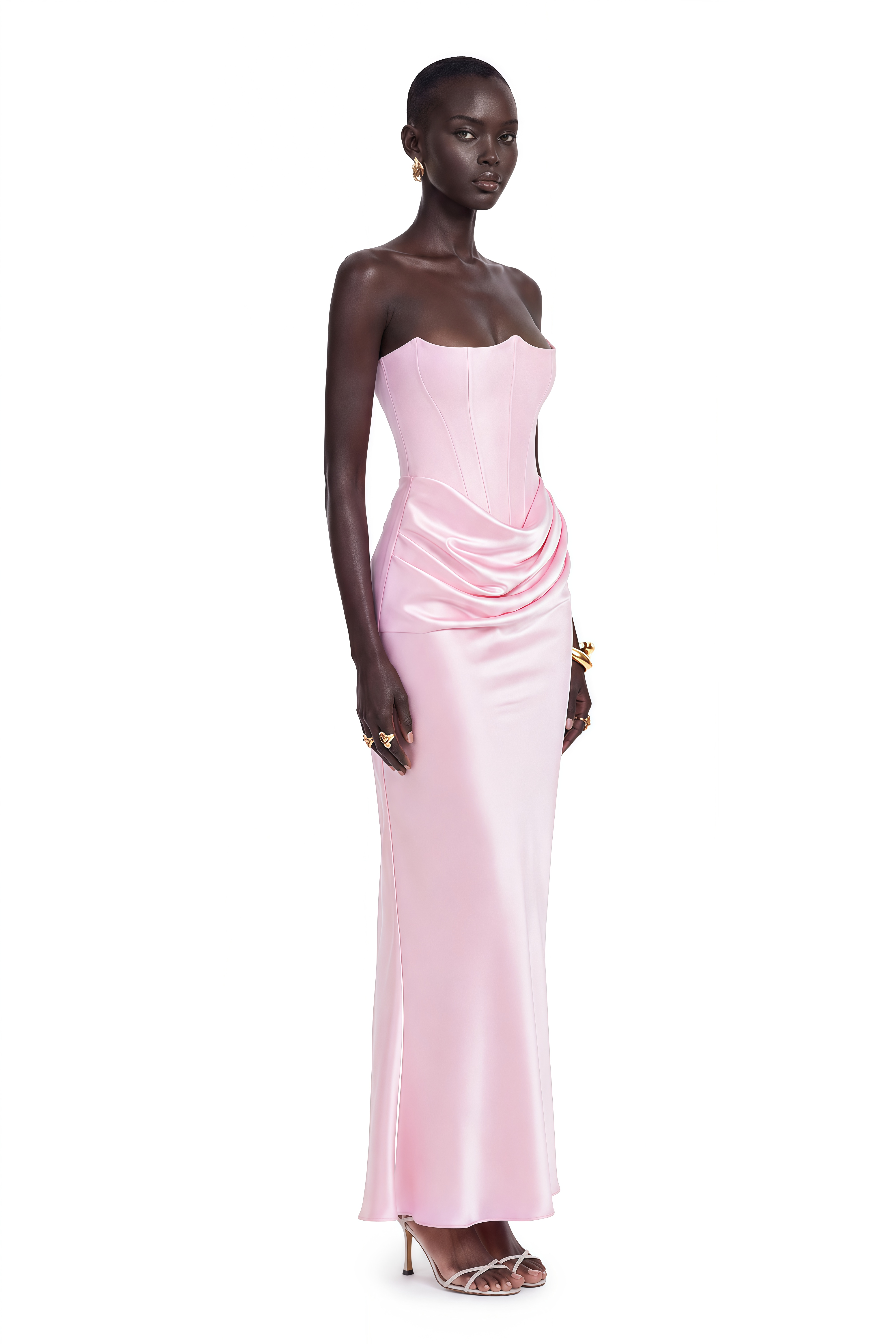 Light pink strapless gown with a corset bodice and draped satin skirt