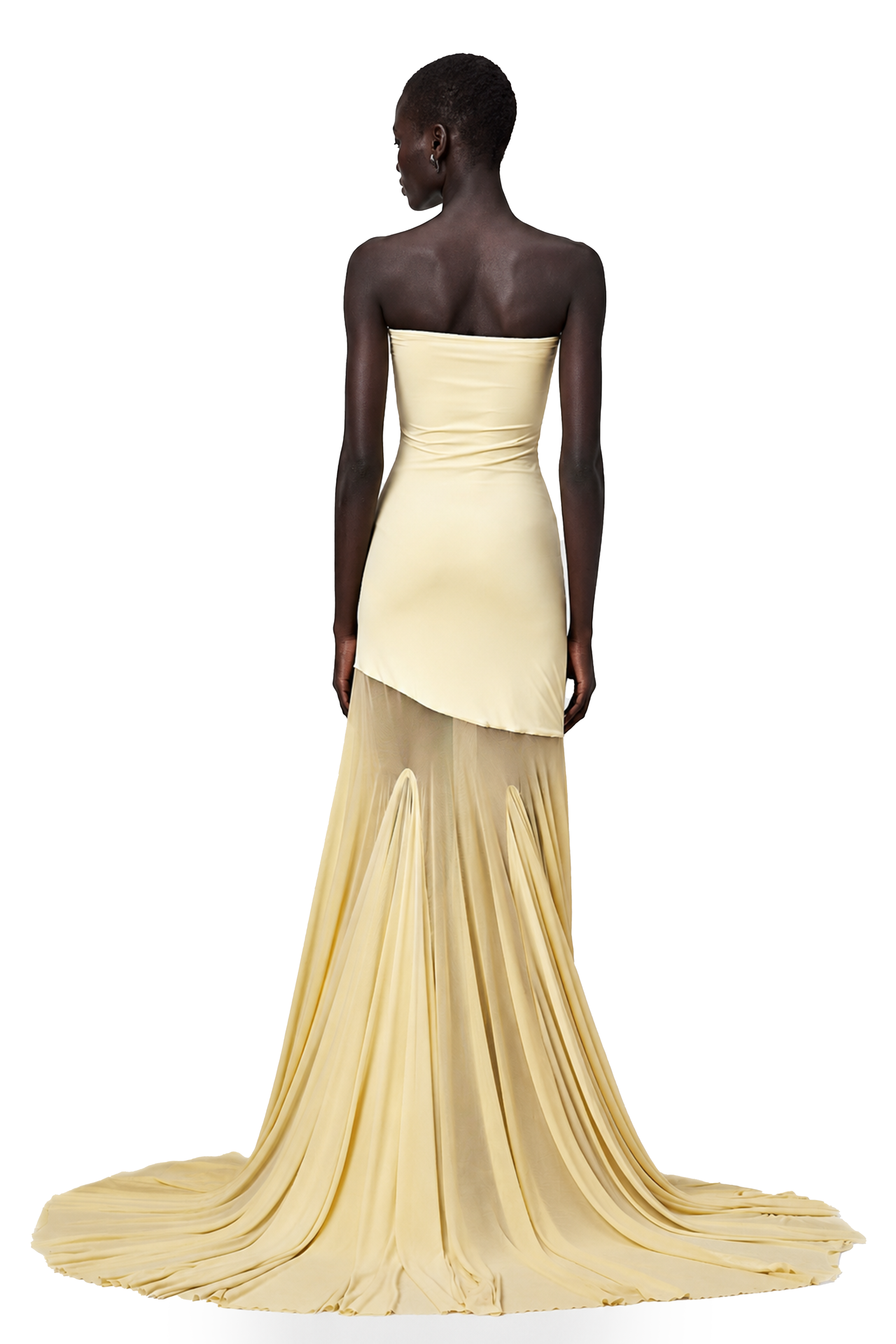 Pale yellow strapless gown with an asymmetrical bodice and pleated sheer skirt