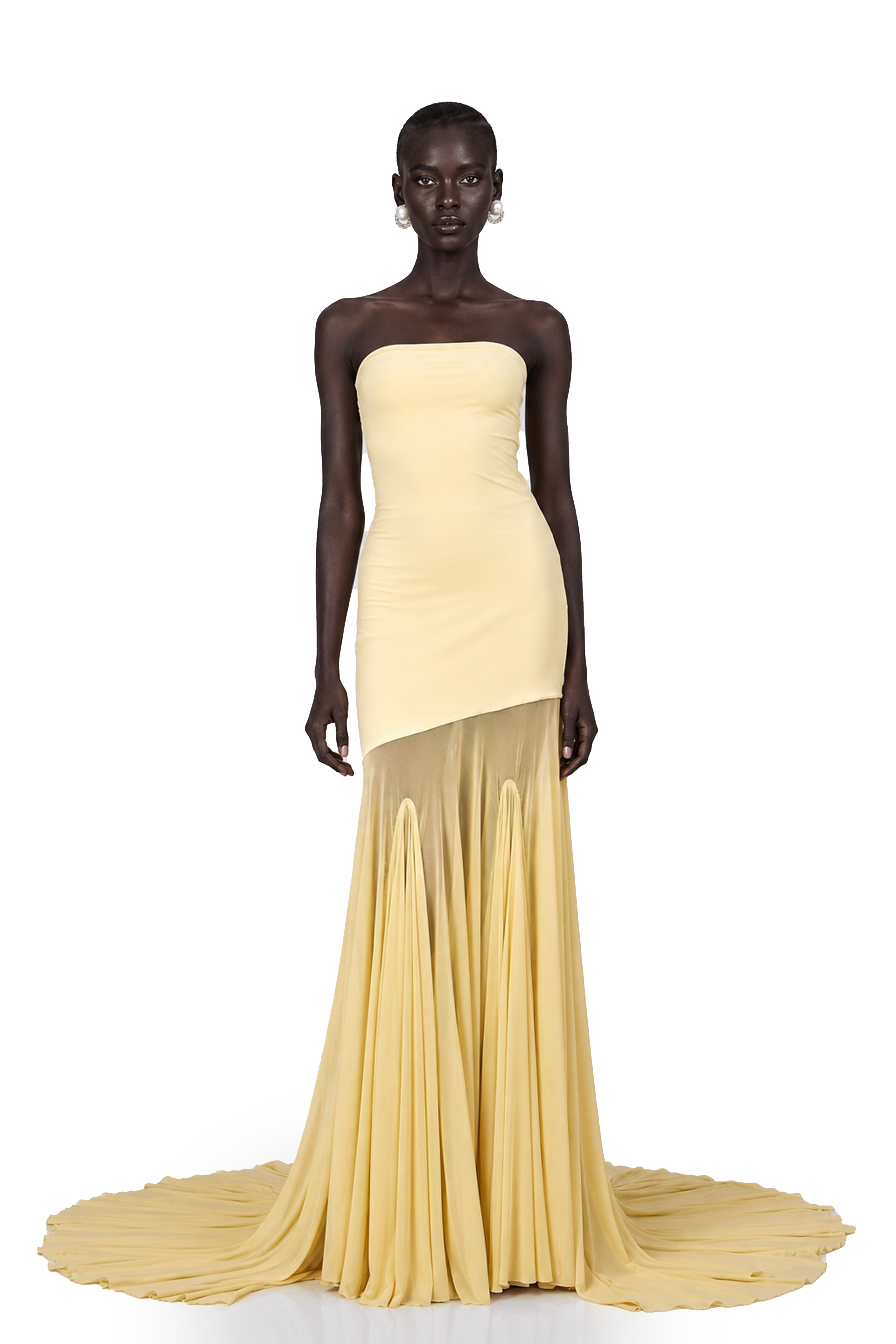 Pale yellow strapless gown with an asymmetrical bodice and pleated sheer skirt