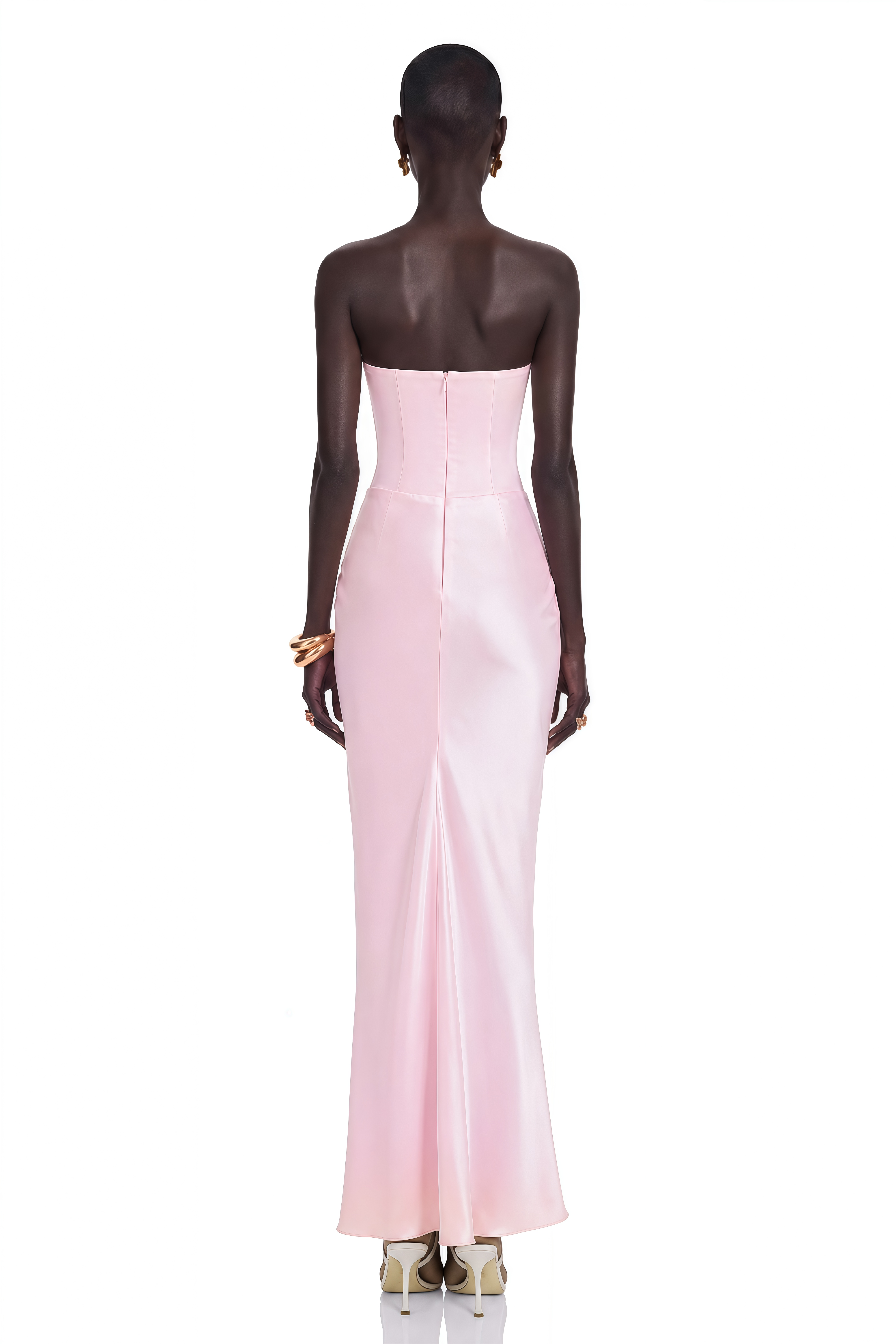 Light pink strapless gown with a corset bodice and draped satin skirt