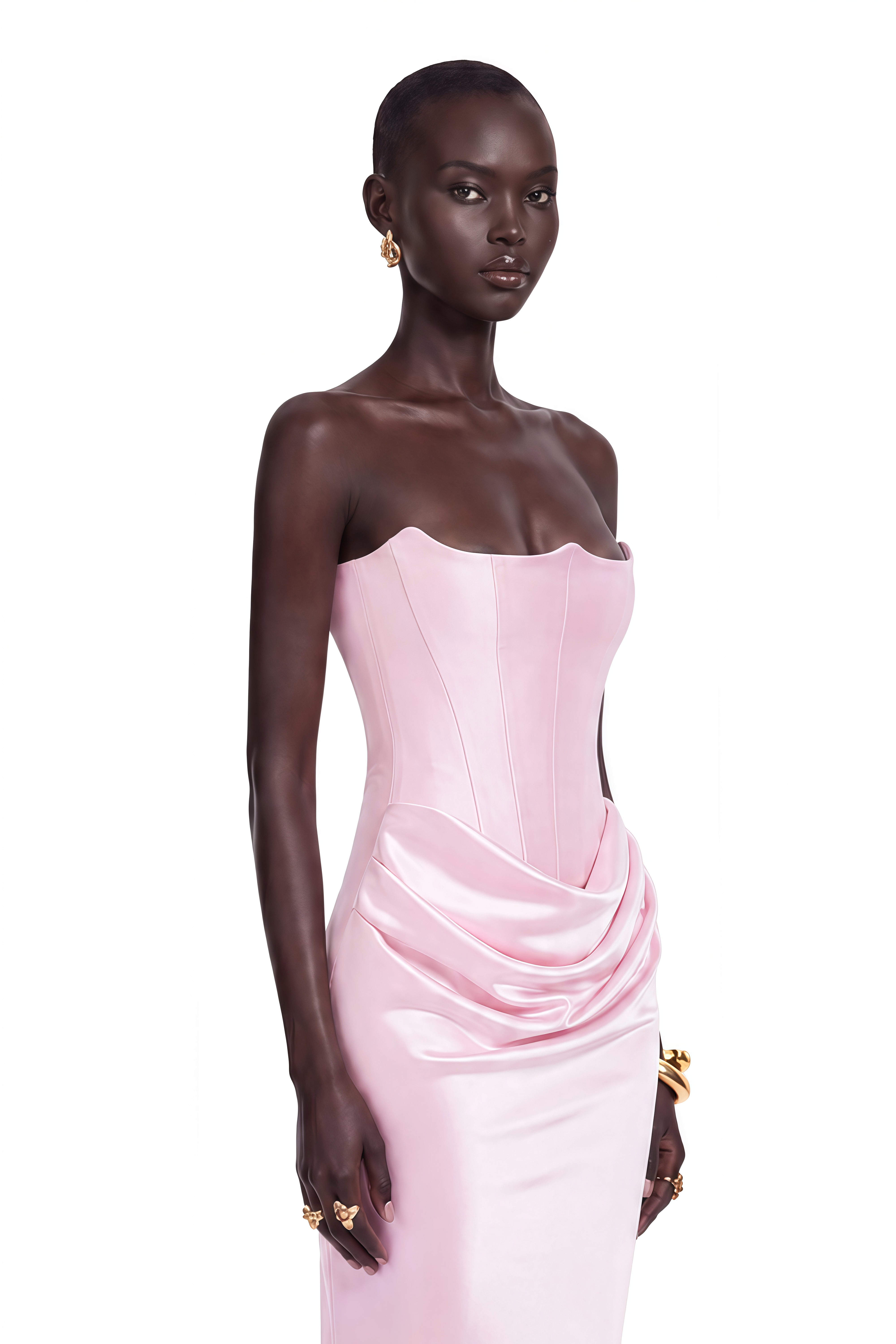 Light pink strapless gown with a corset bodice and draped satin skirt