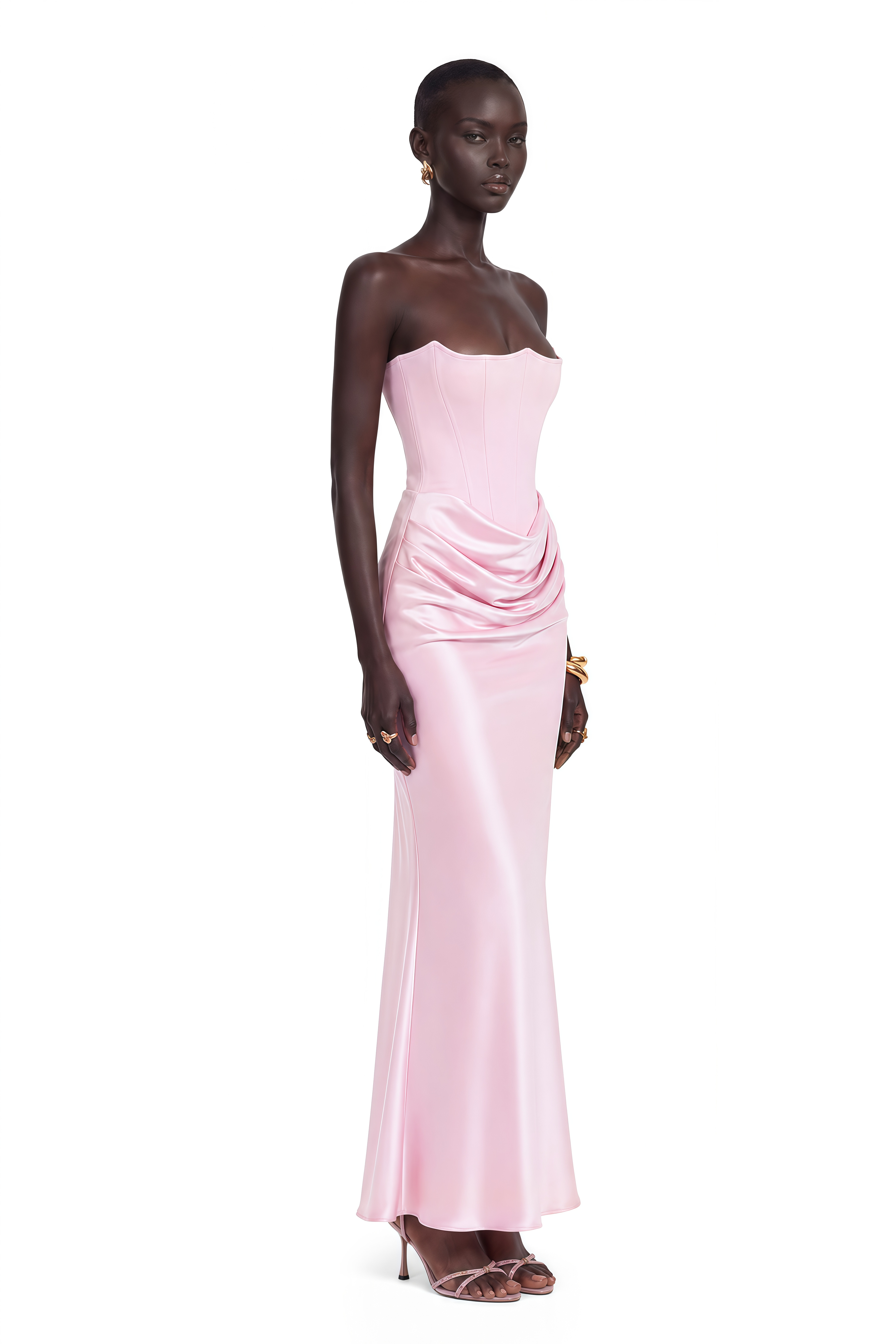 Light pink strapless gown with a corset bodice and draped satin skirt