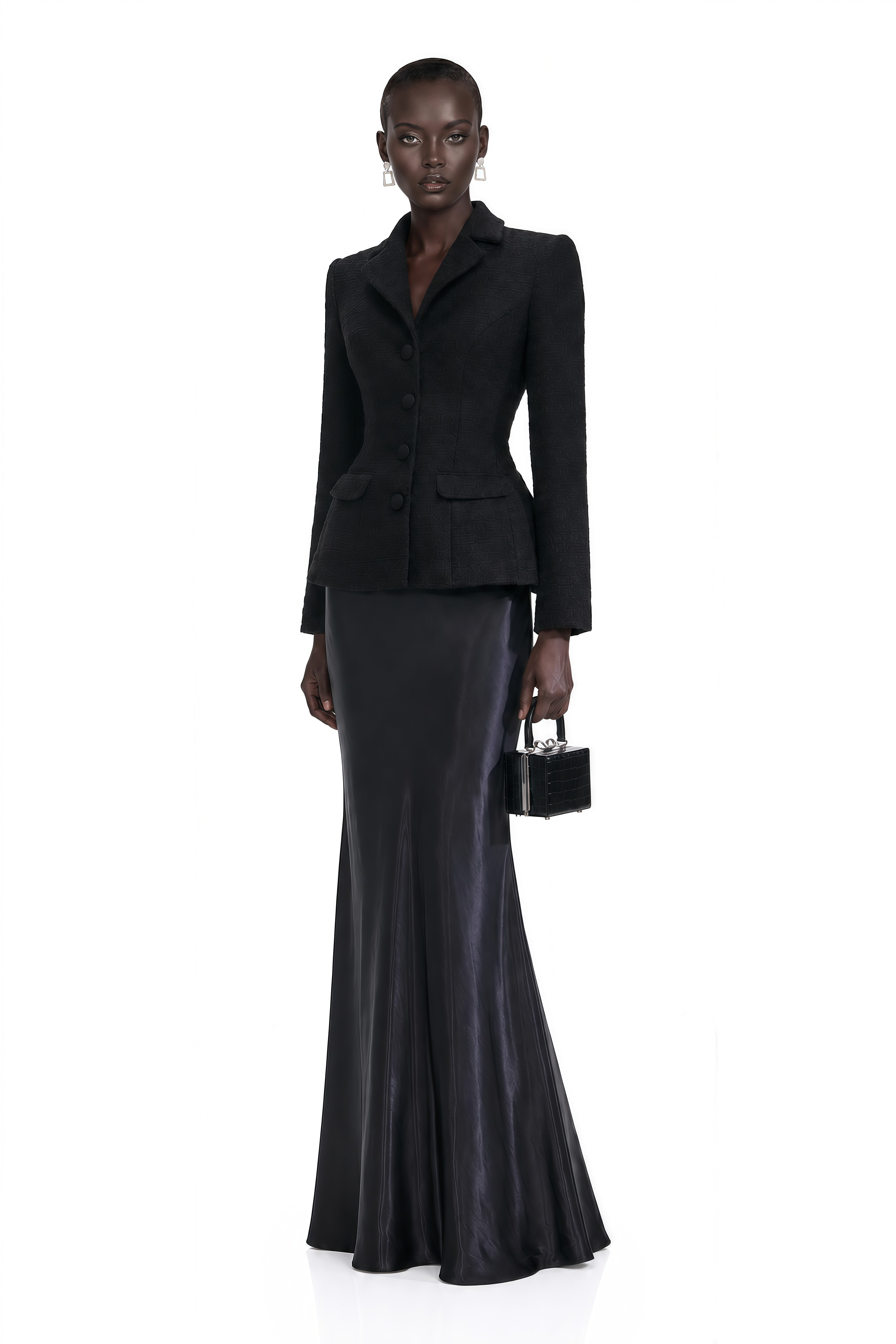 Black blazer paired with a black satin maxi skirt