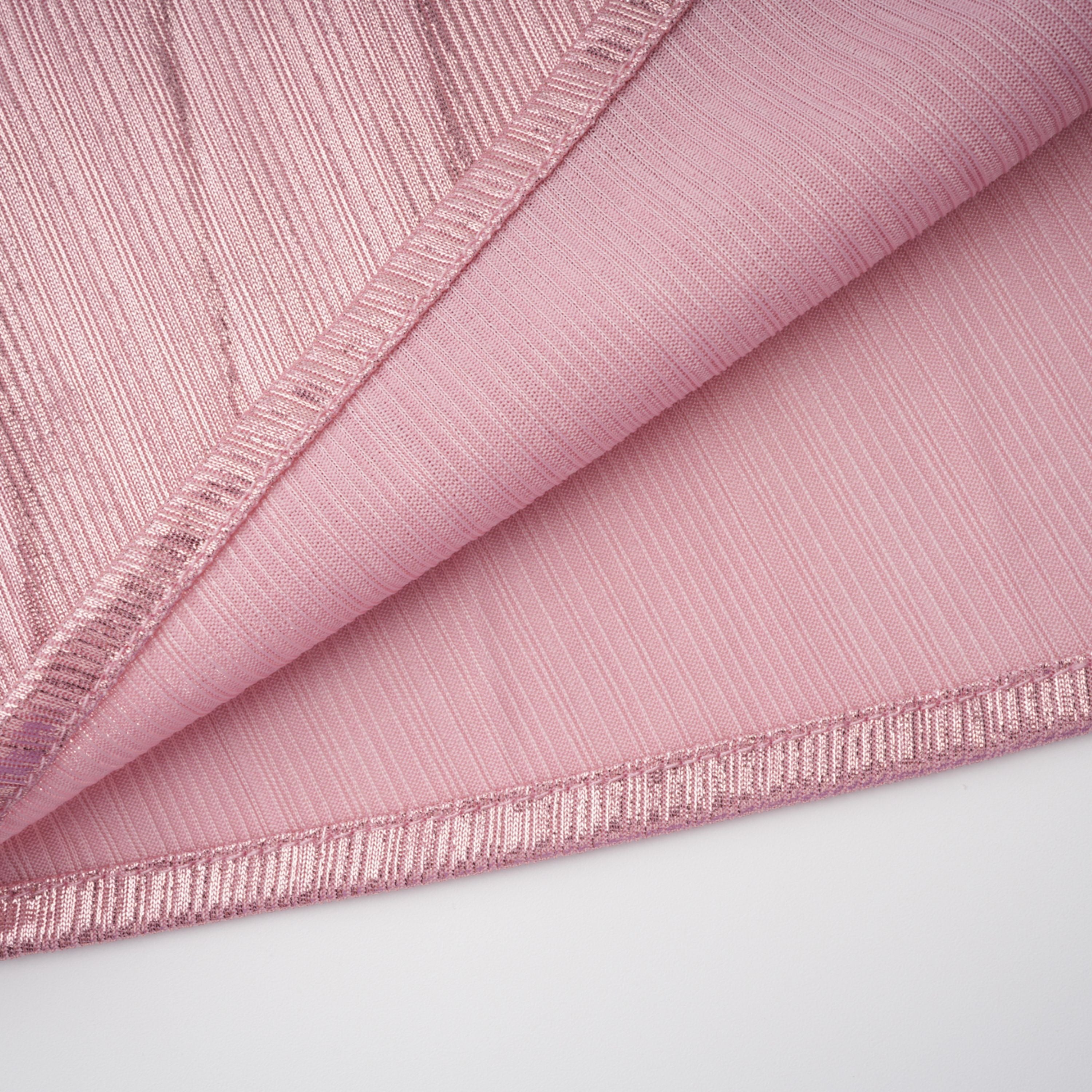 Metallic rose pink pleat halter gown with a cinched waist and high leg slit