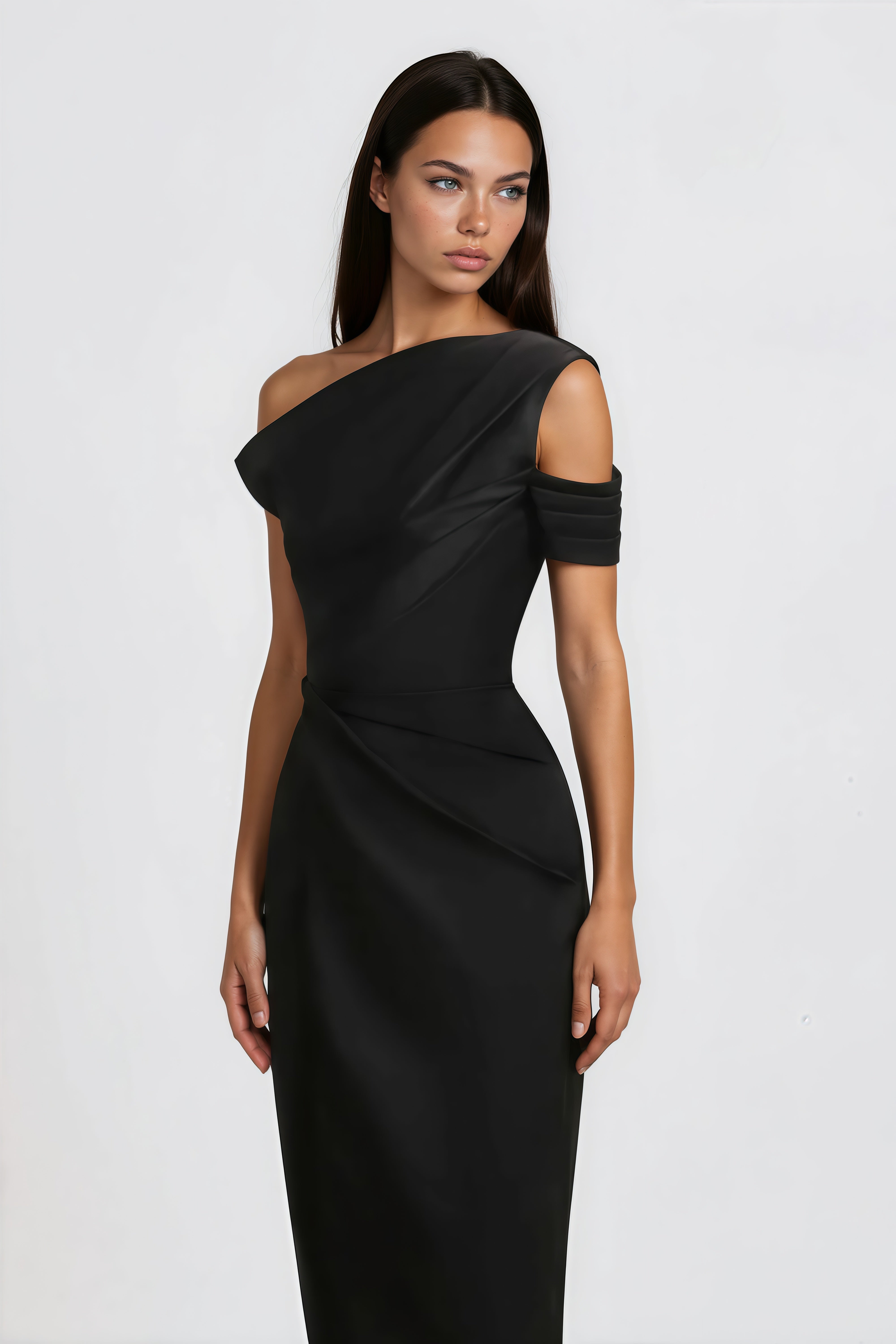 Black midi dress with a pleated asymmetrical neckline and a draped wrap skirt