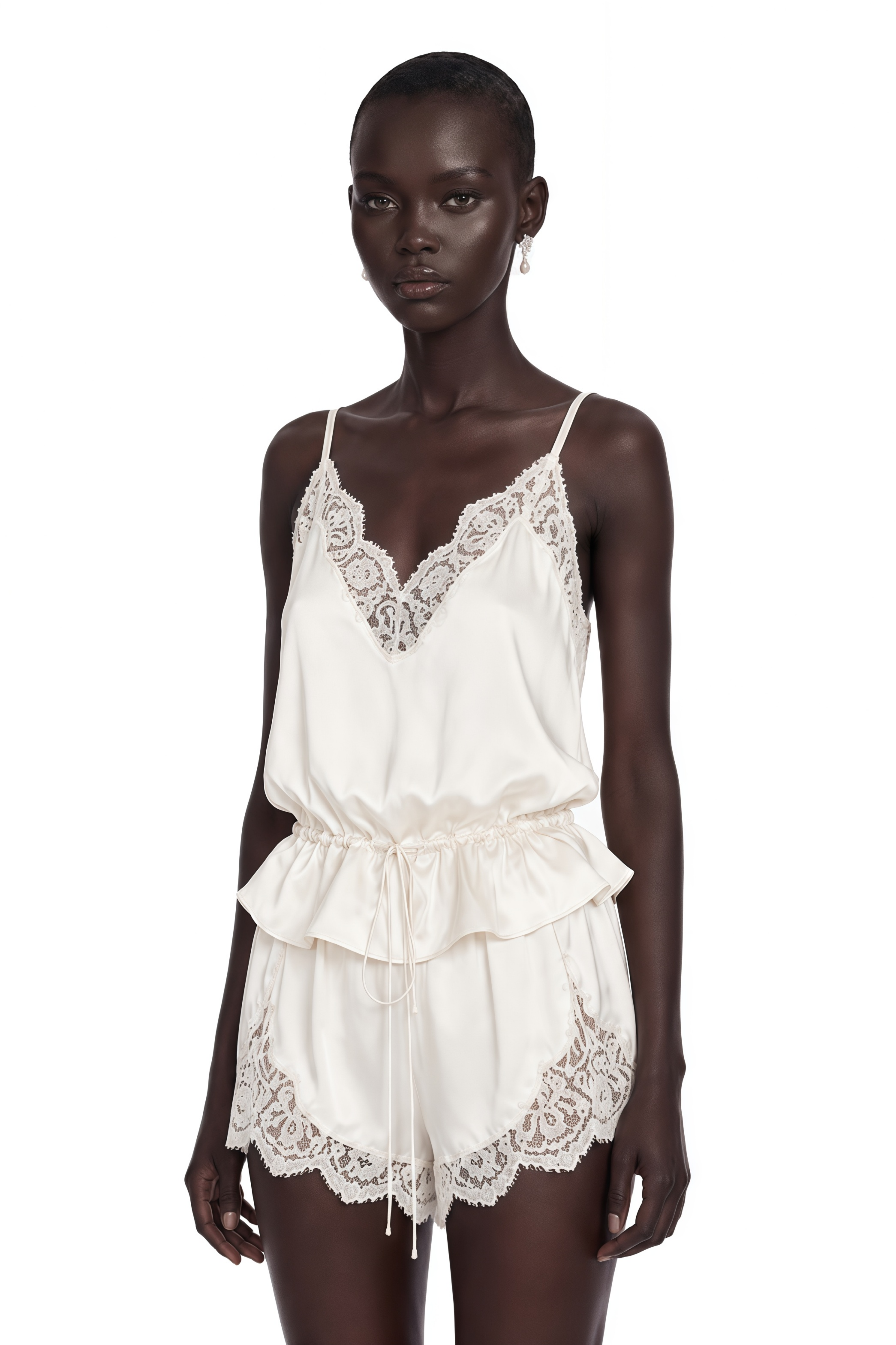 Off-white satin camisole and shorts pajama set with lace trim