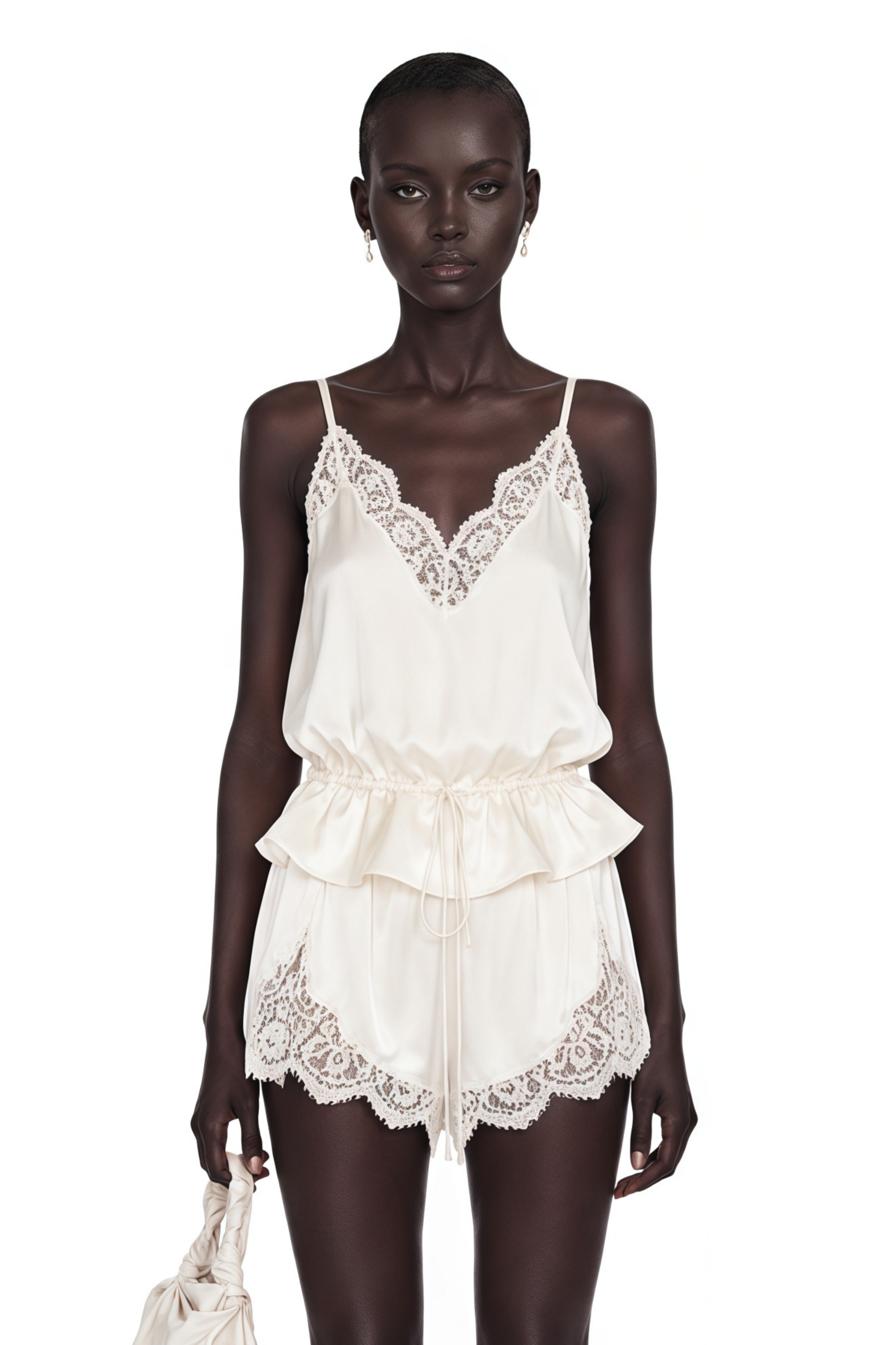 Off-white satin camisole and shorts pajama set with lace trim