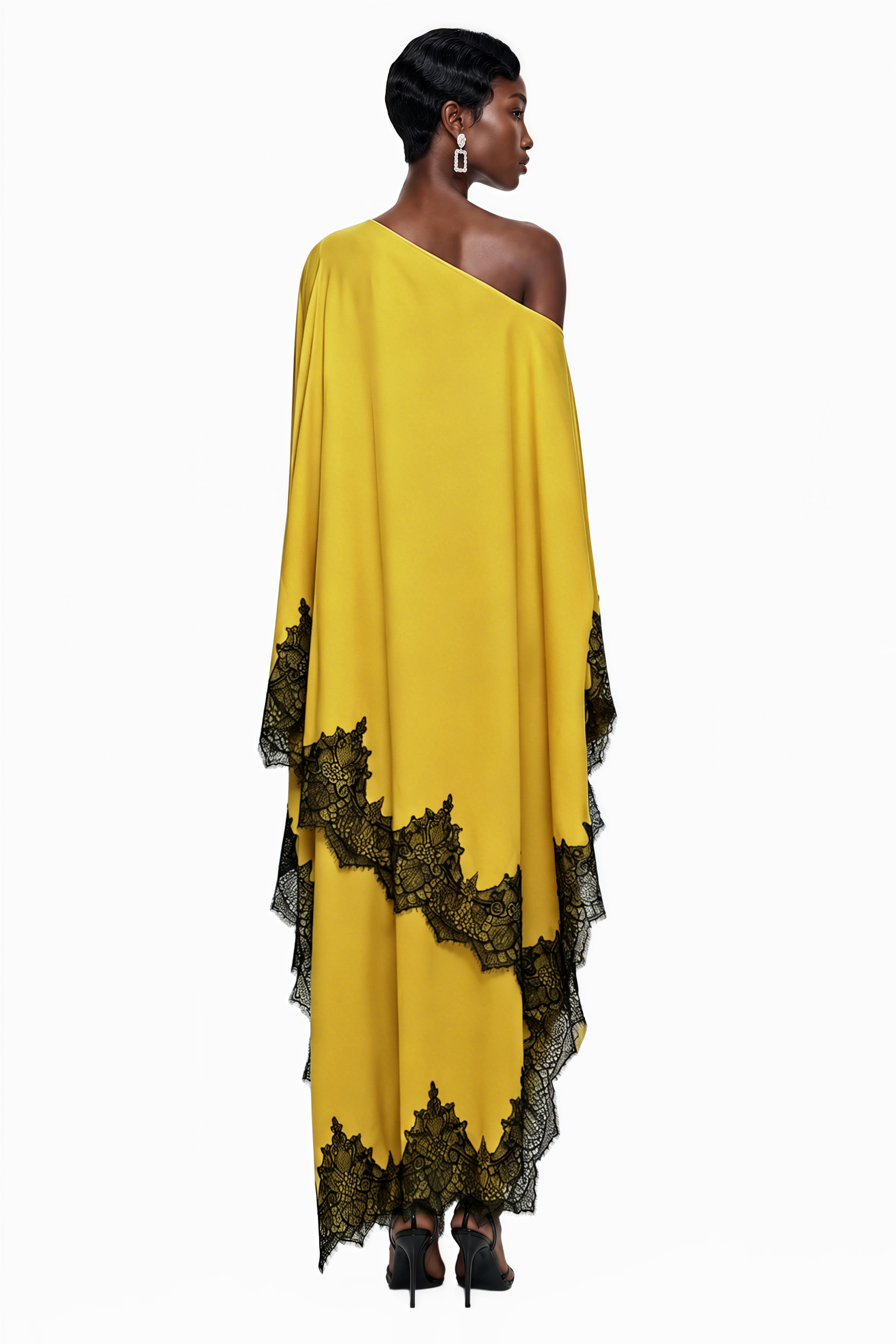 Yellow off-the-shoulder maxi dress with black lace trim