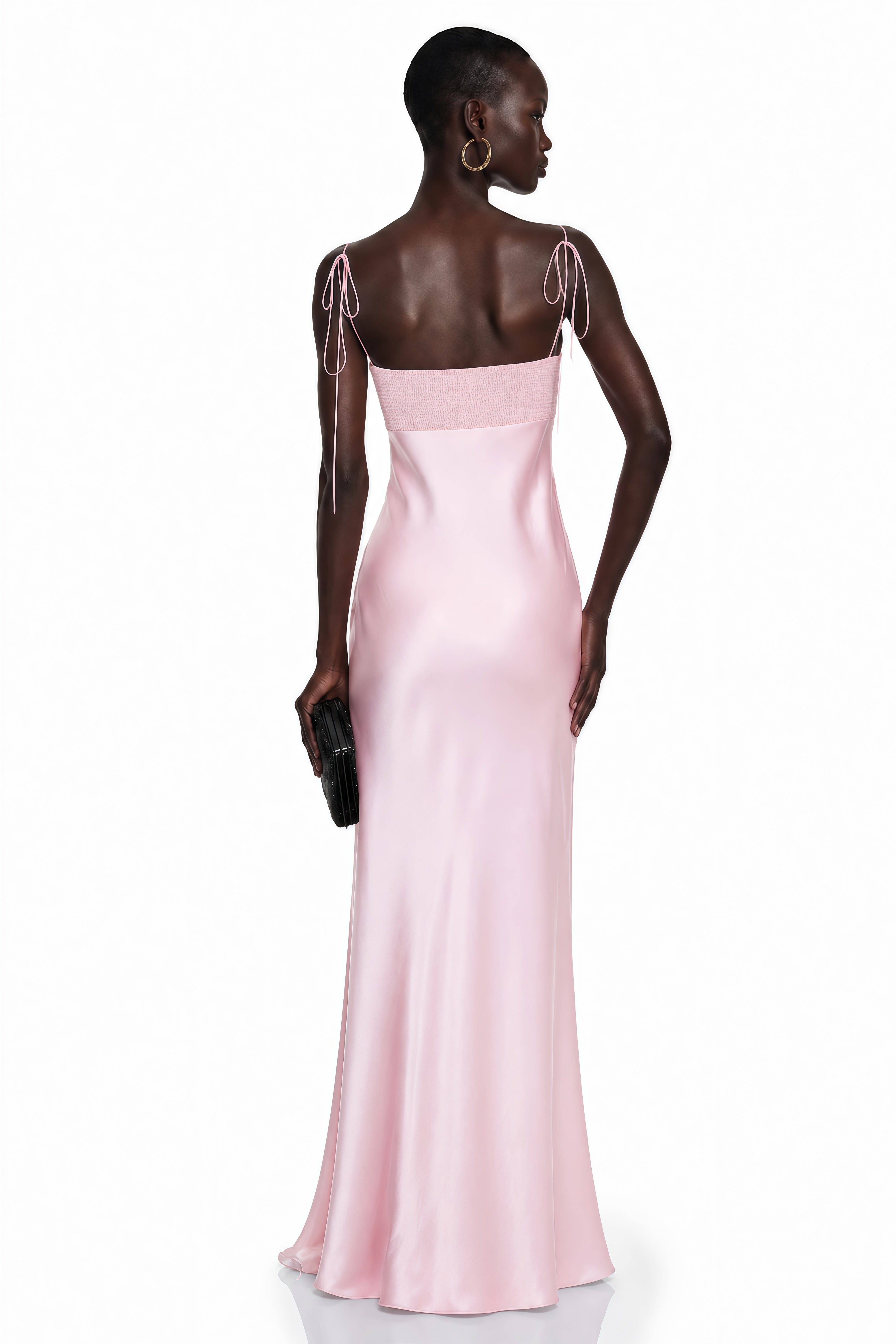 Pink satin slip maxi dress featuring a sculpted seashell-style bustier and thin spaghetti straps