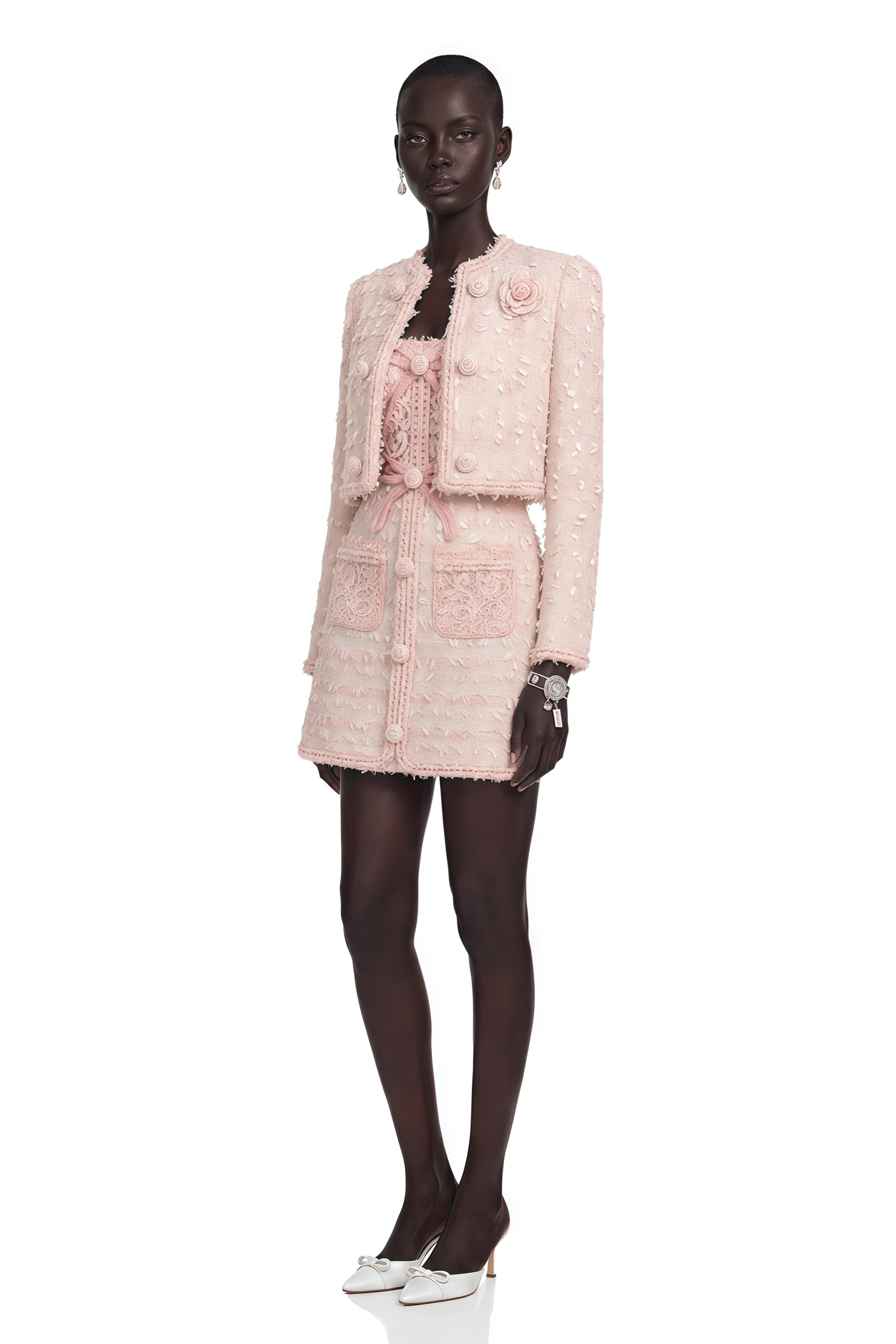 Light pink tweed cropped jacket and matching button-front mini skirt
