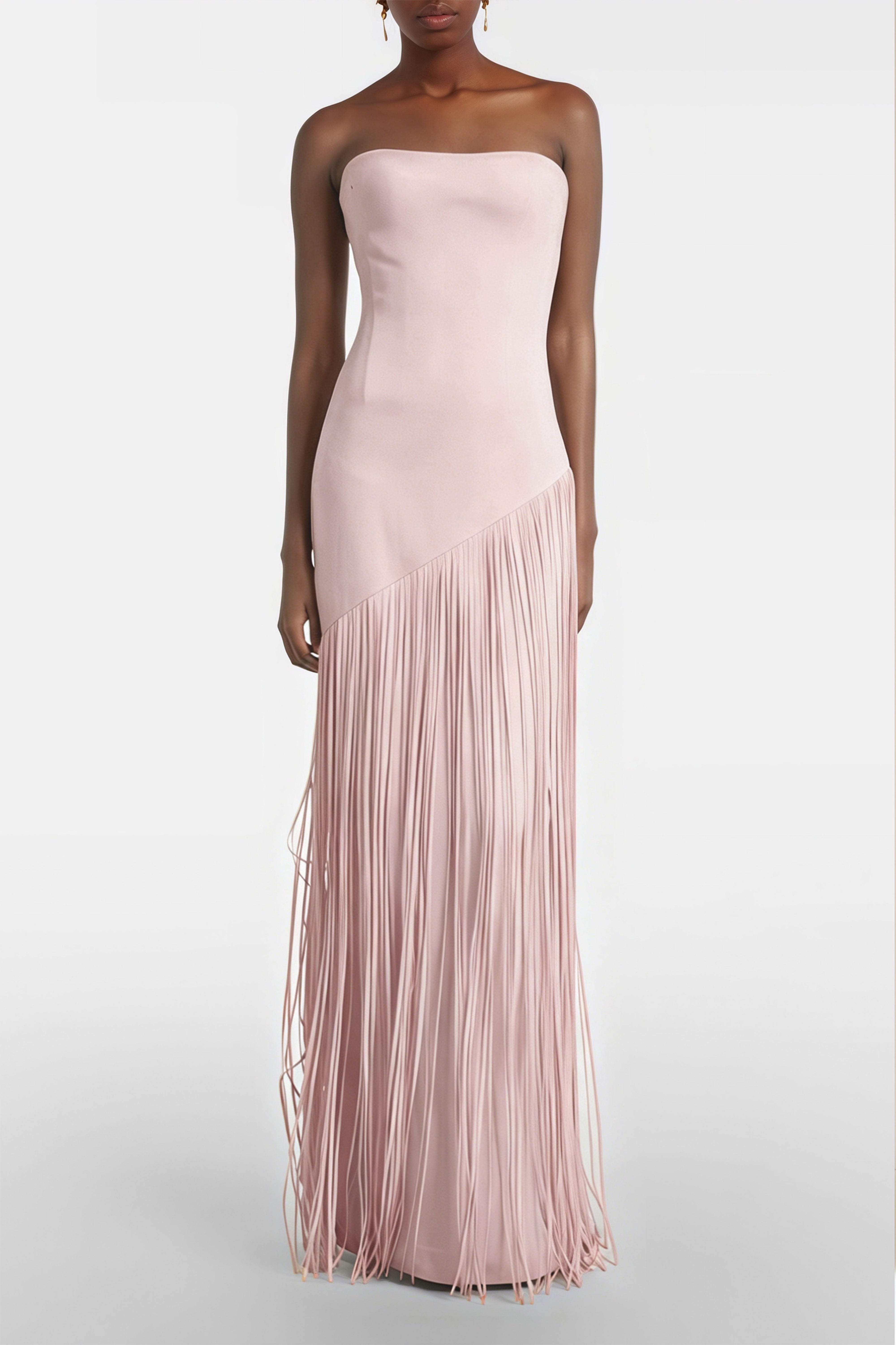 Blush pink maxi dress with a matching overlay cape and a long asymmetric fringe skirt