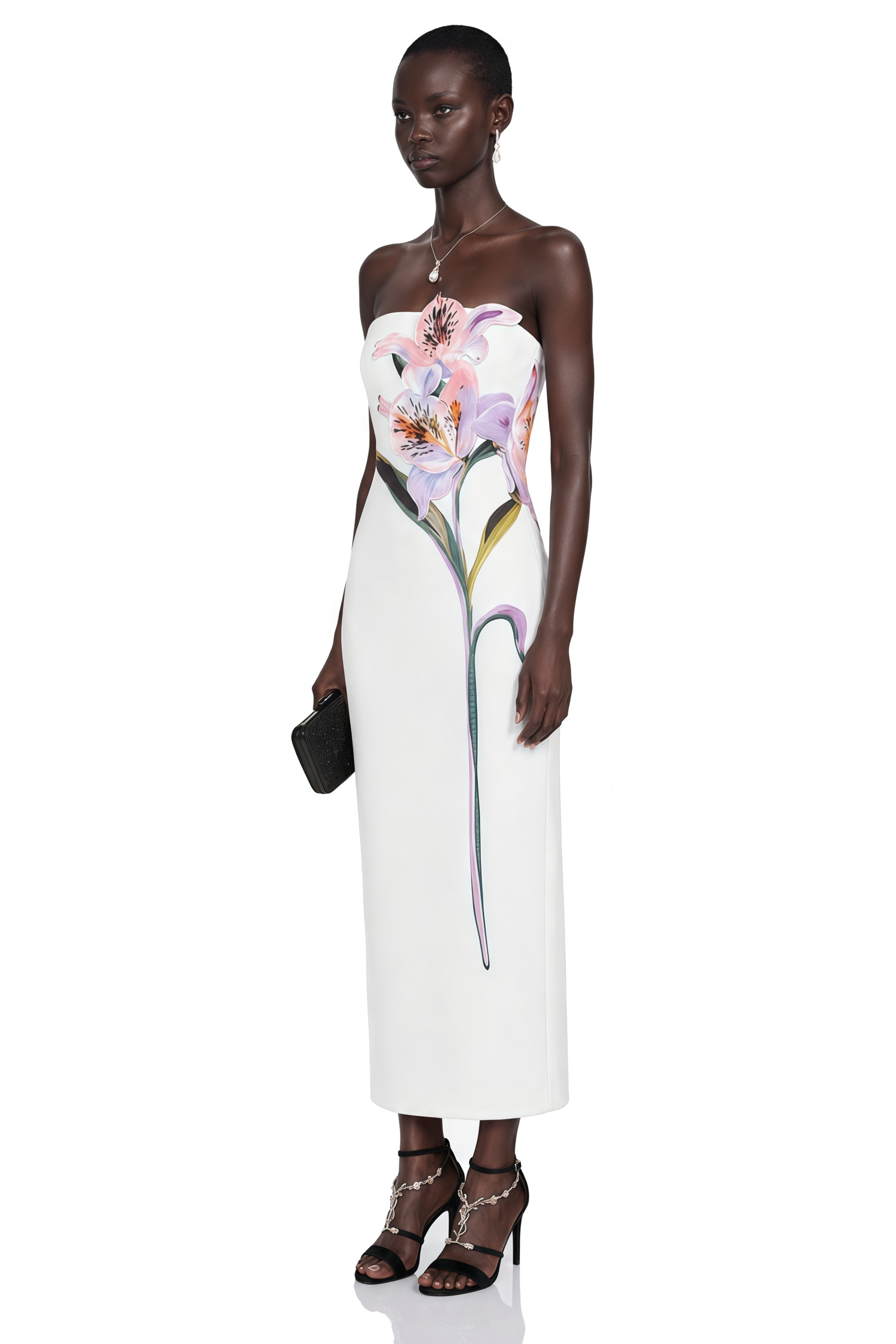White strapless column gown with a large painted floral graphic
