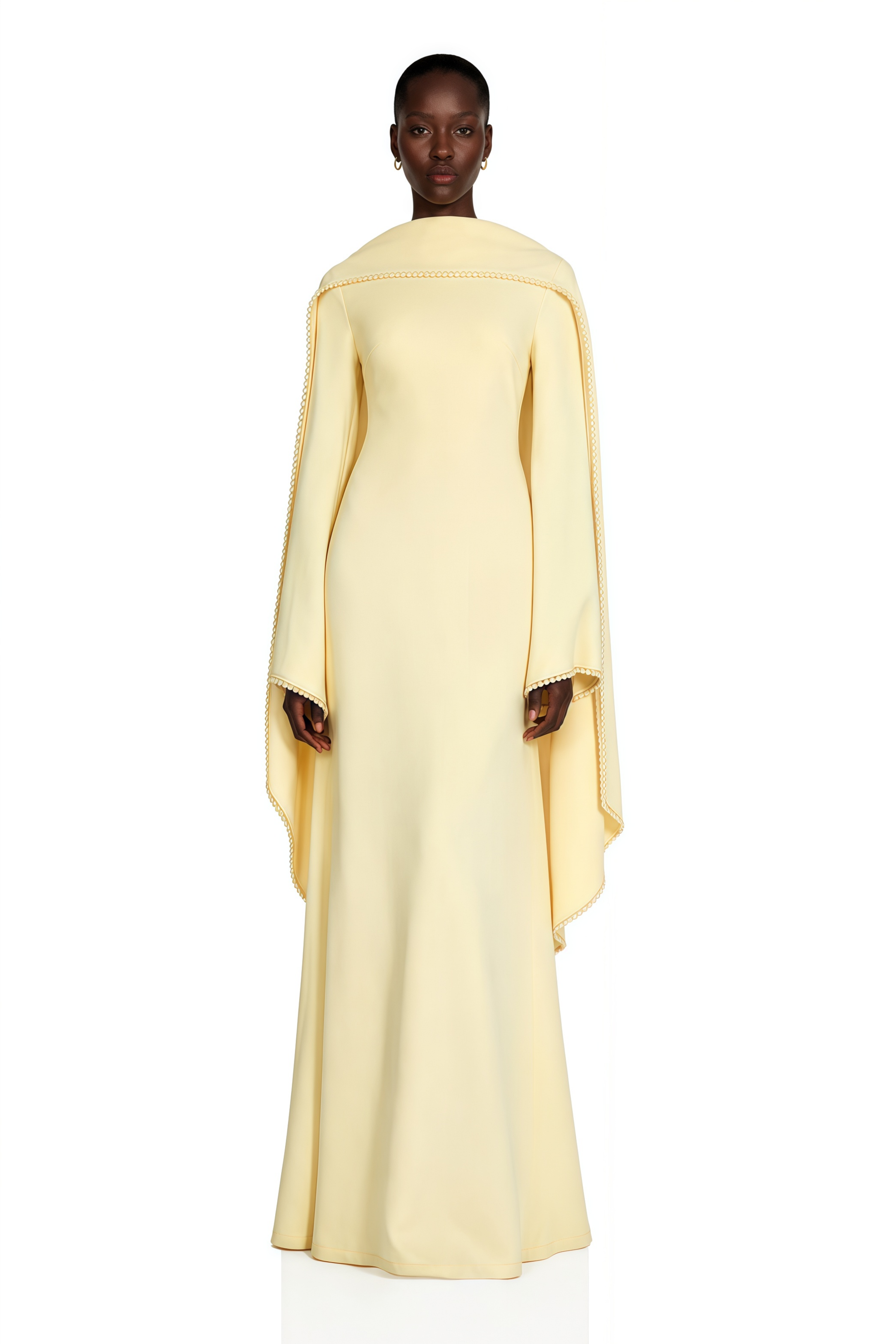 Light yellow long-sleeve maxi dress with a matching beaded cape overlay
