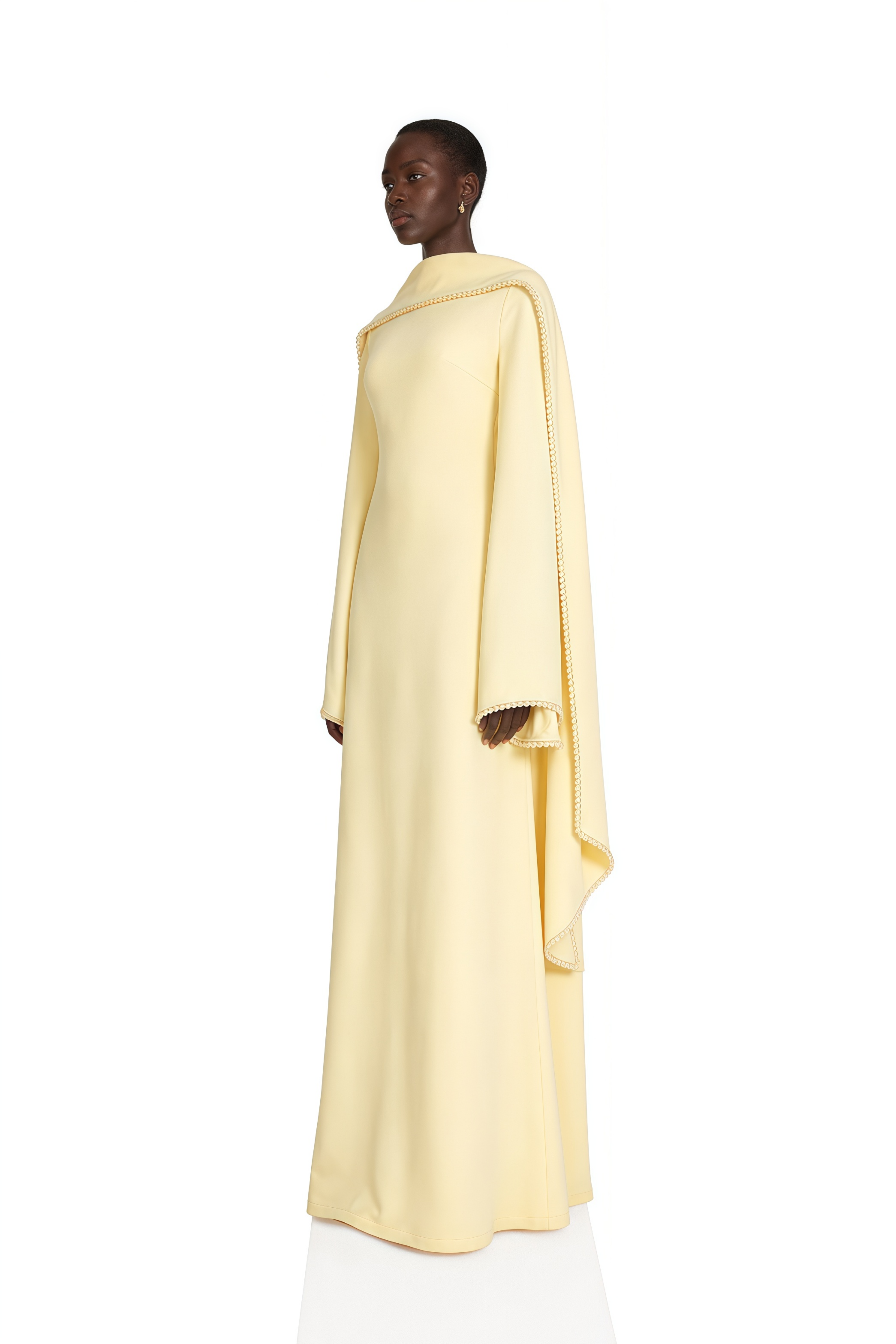 Light yellow long-sleeve maxi dress with a matching beaded cape overlay