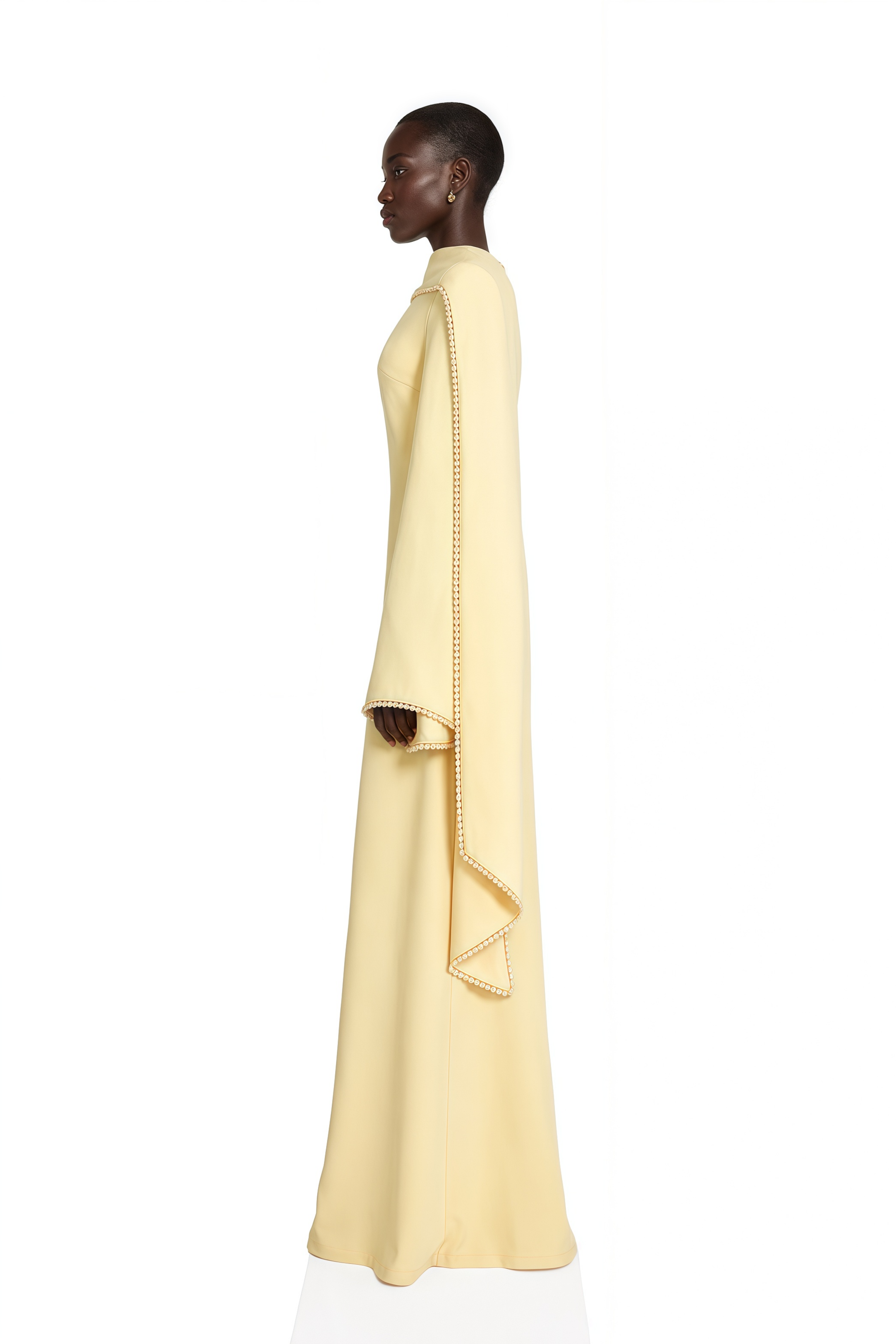 Light yellow long-sleeve maxi dress with a matching beaded cape overlay