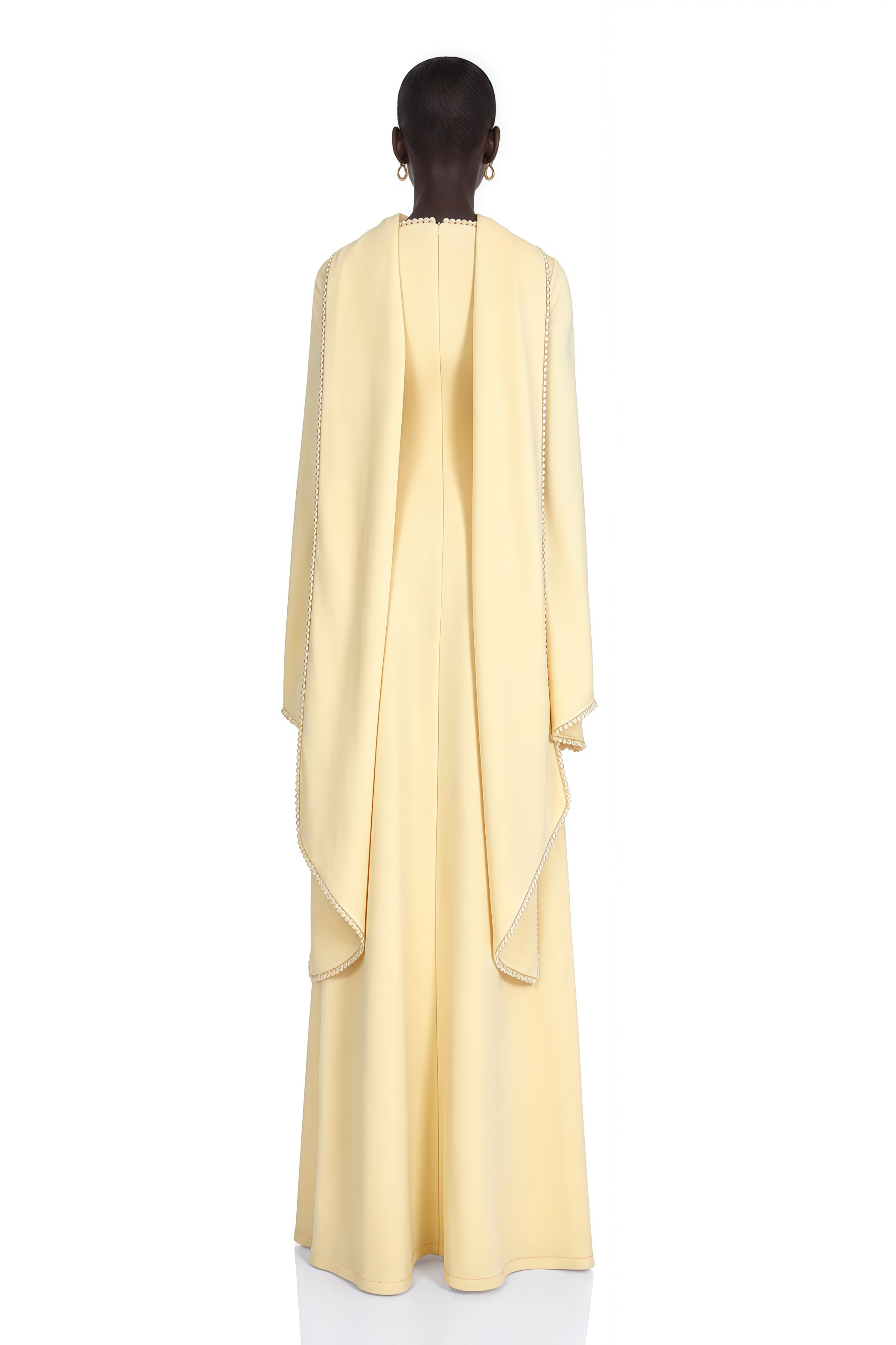 Light yellow long-sleeve maxi dress with a matching beaded cape overlay