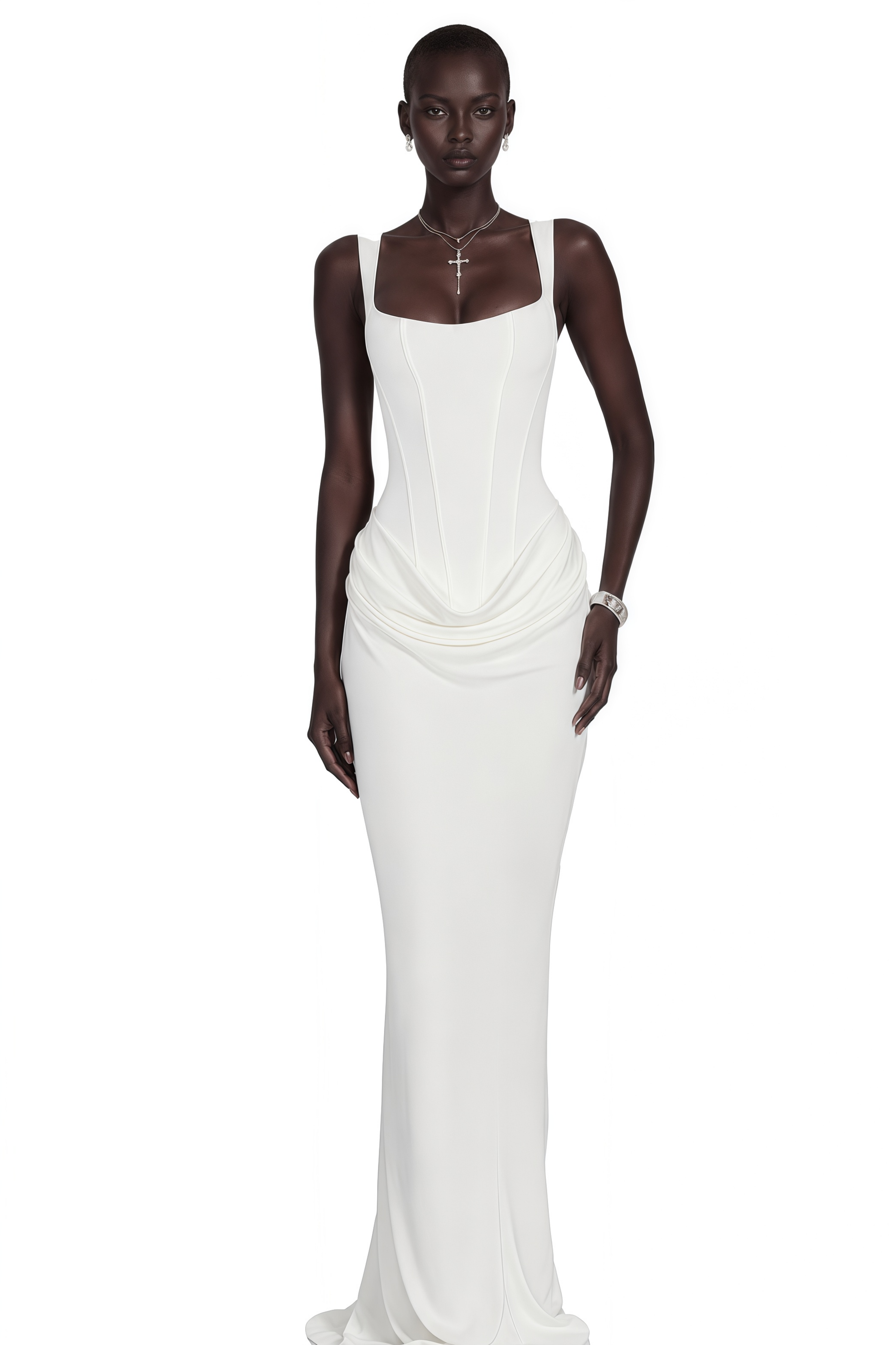 White gown with a corset bodice and a draped waist