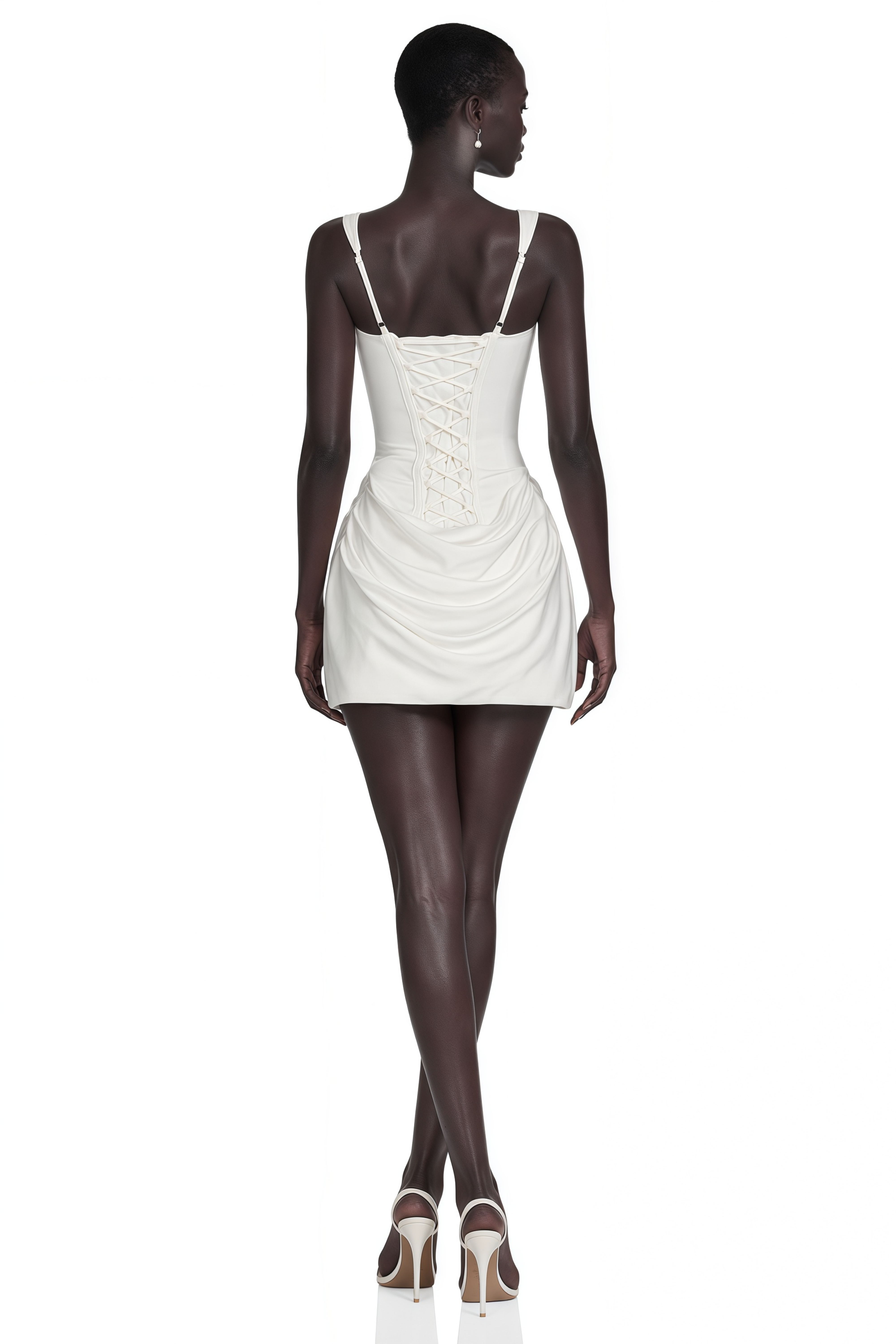 White corset mini dress with a draped skirt