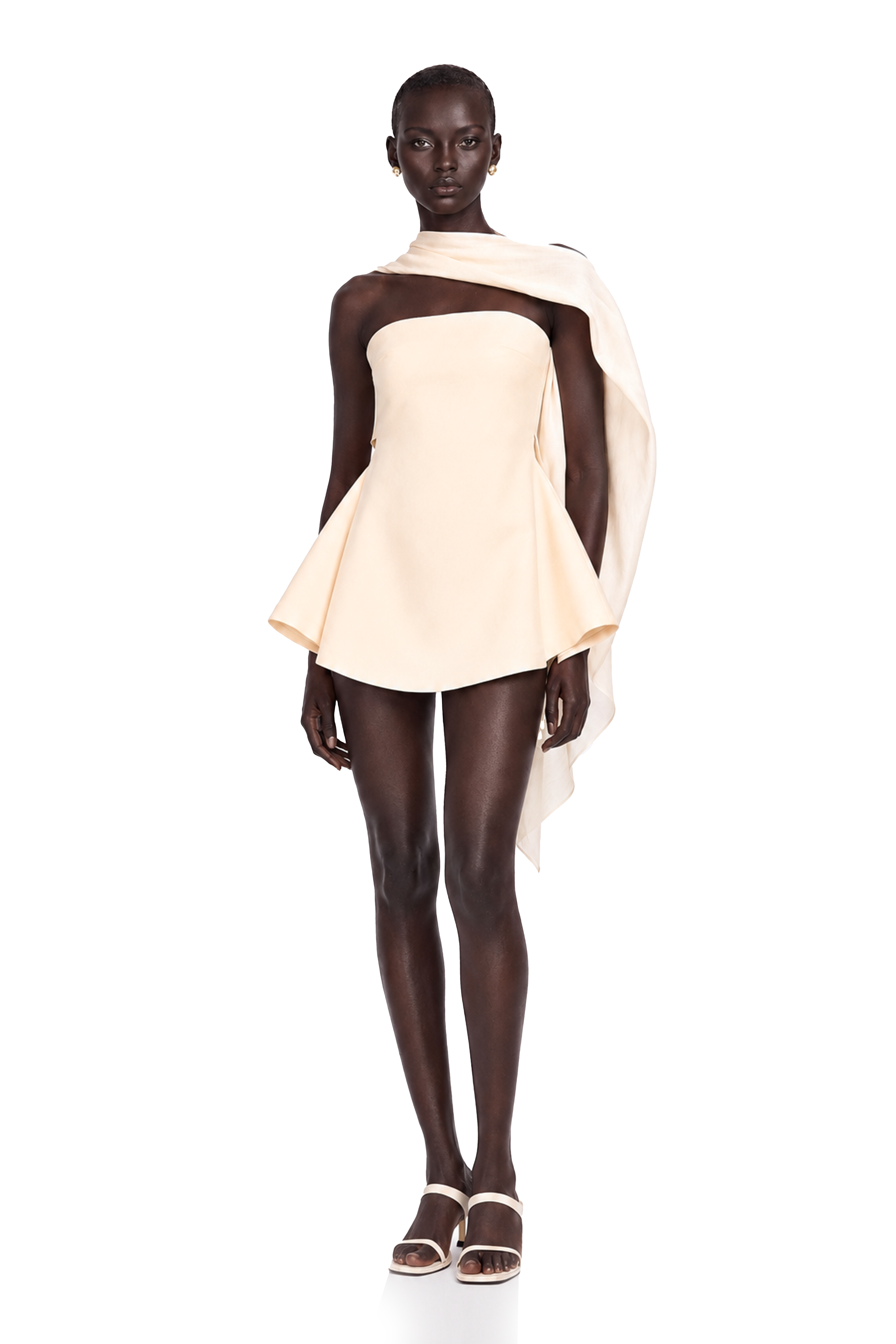 Cream strapless mini dress with a draped cape