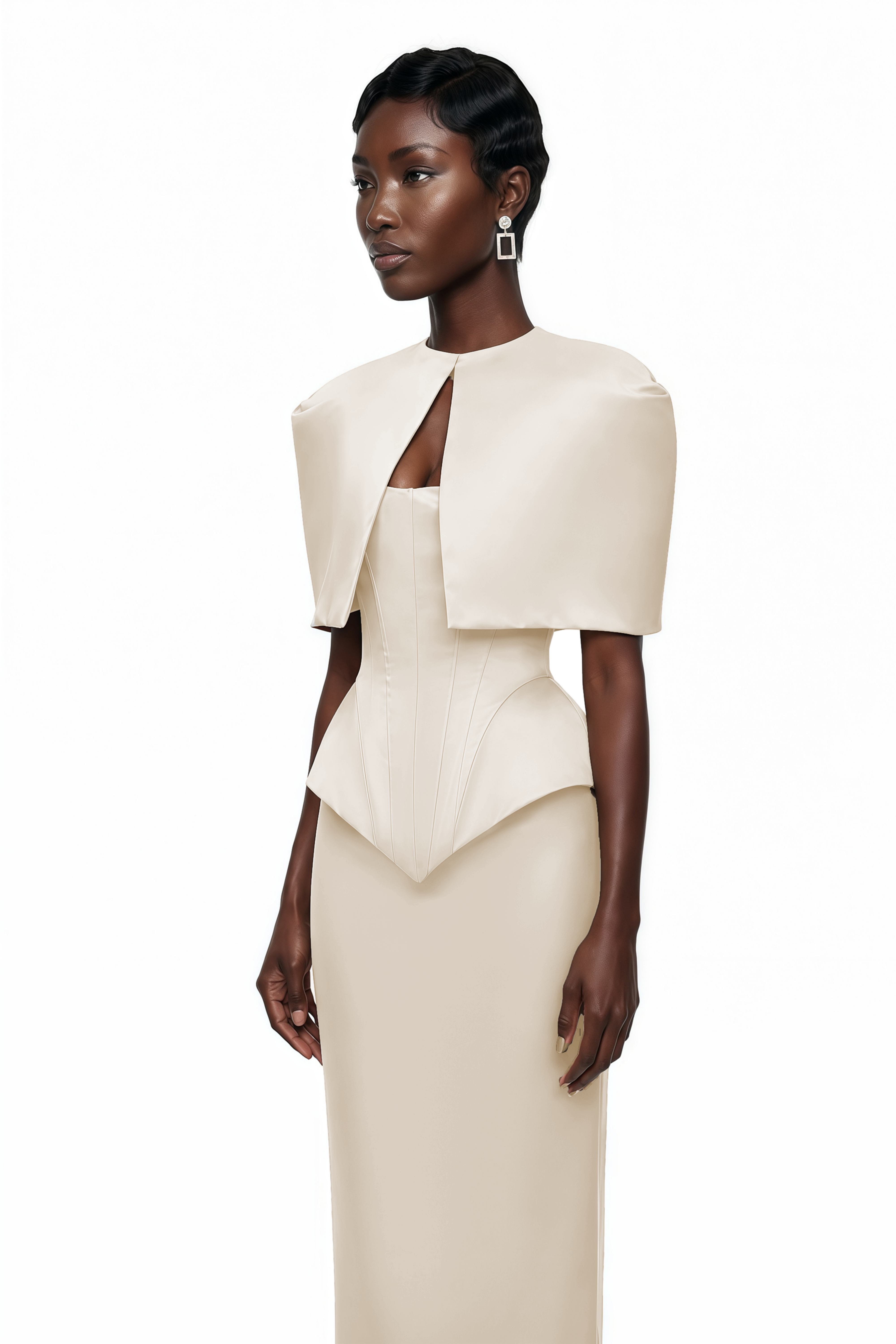 Cream structured gown with a matching bolero and a peplum bodice