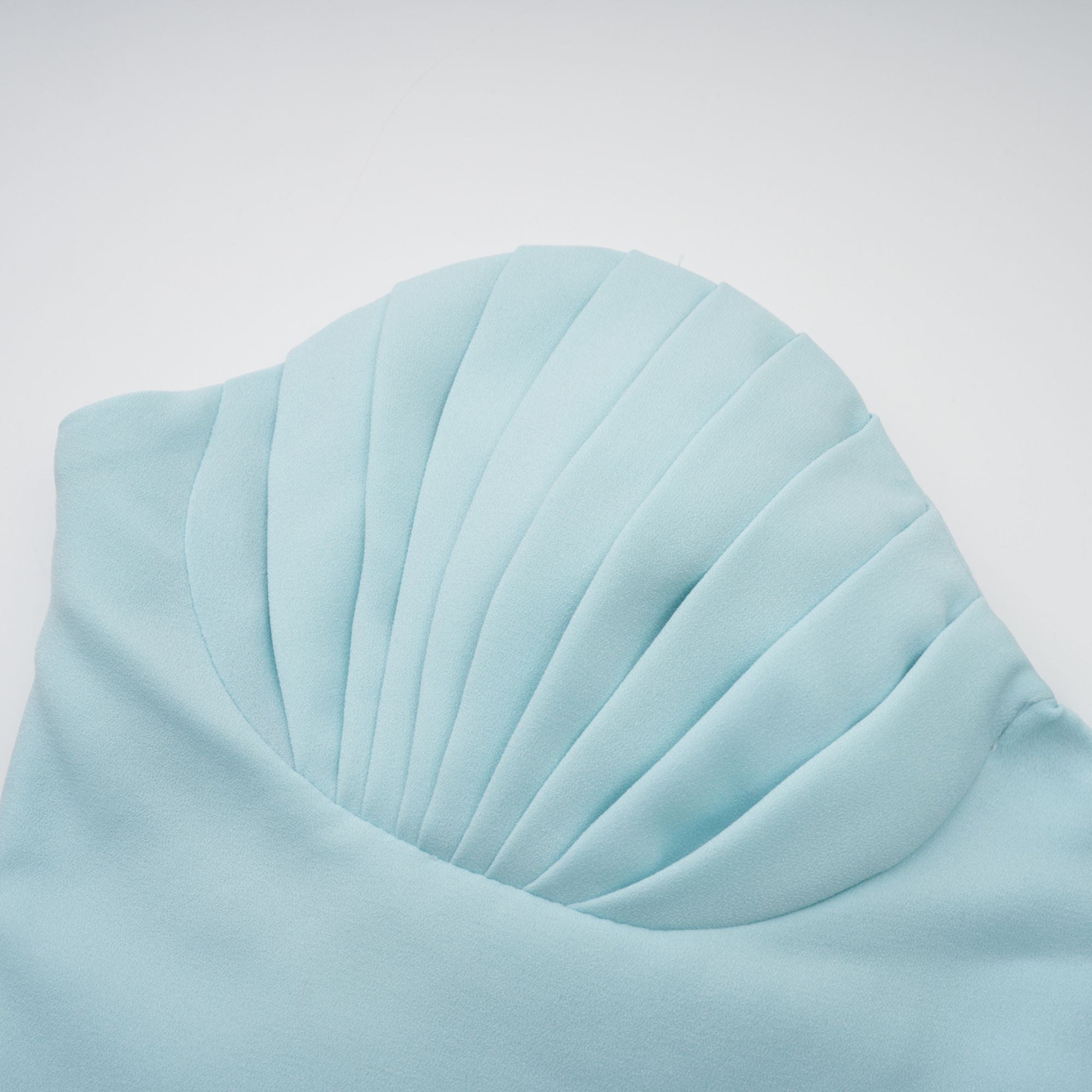 Light blue strapless gown with sweetheart neckline and pleated skirt