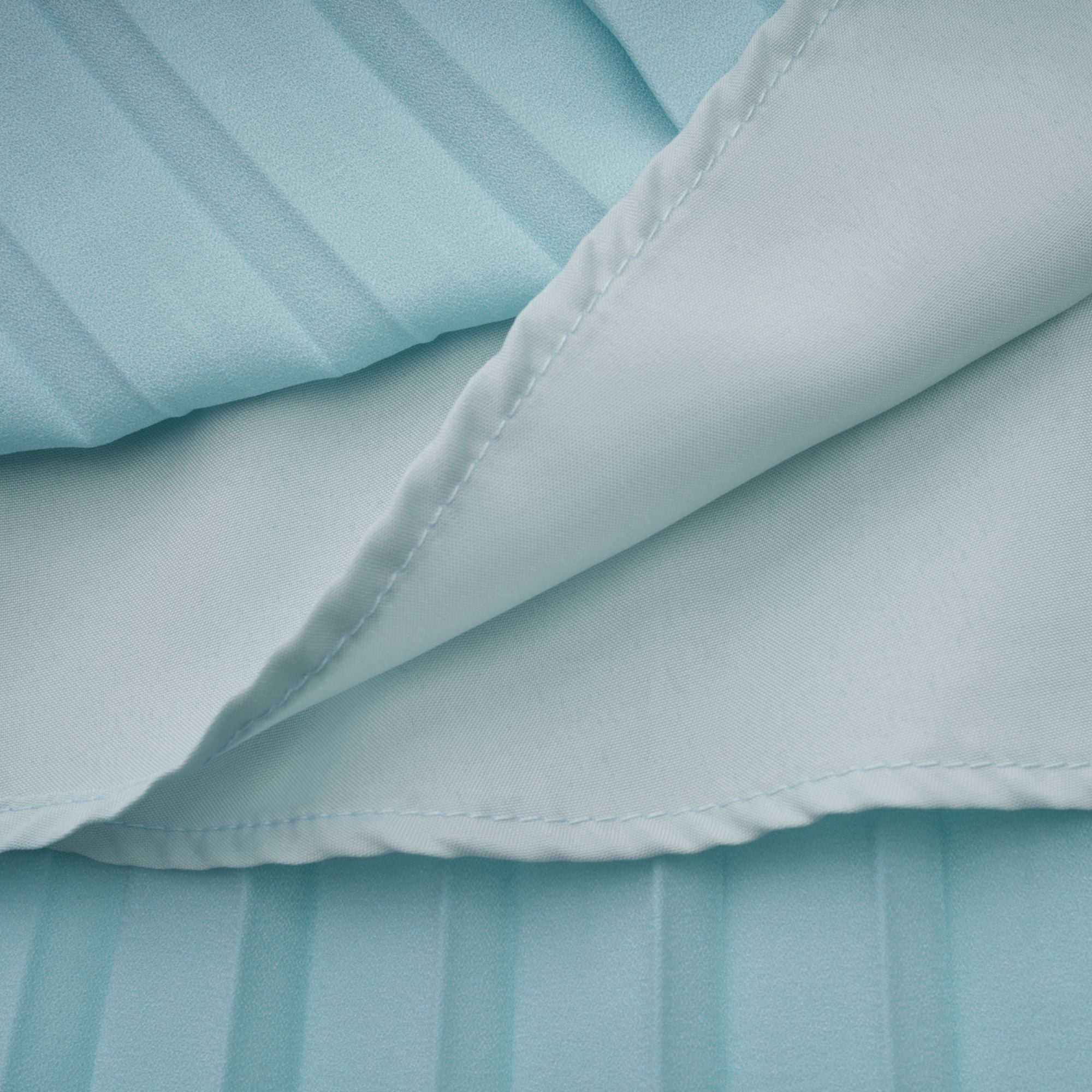 Light blue strapless gown with sweetheart neckline and pleated skirt