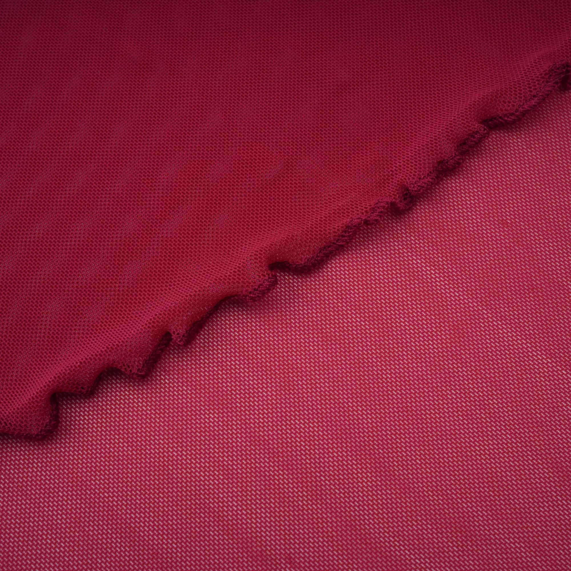 Burgundy ruched gown with a draped high neckline and sheer skirt