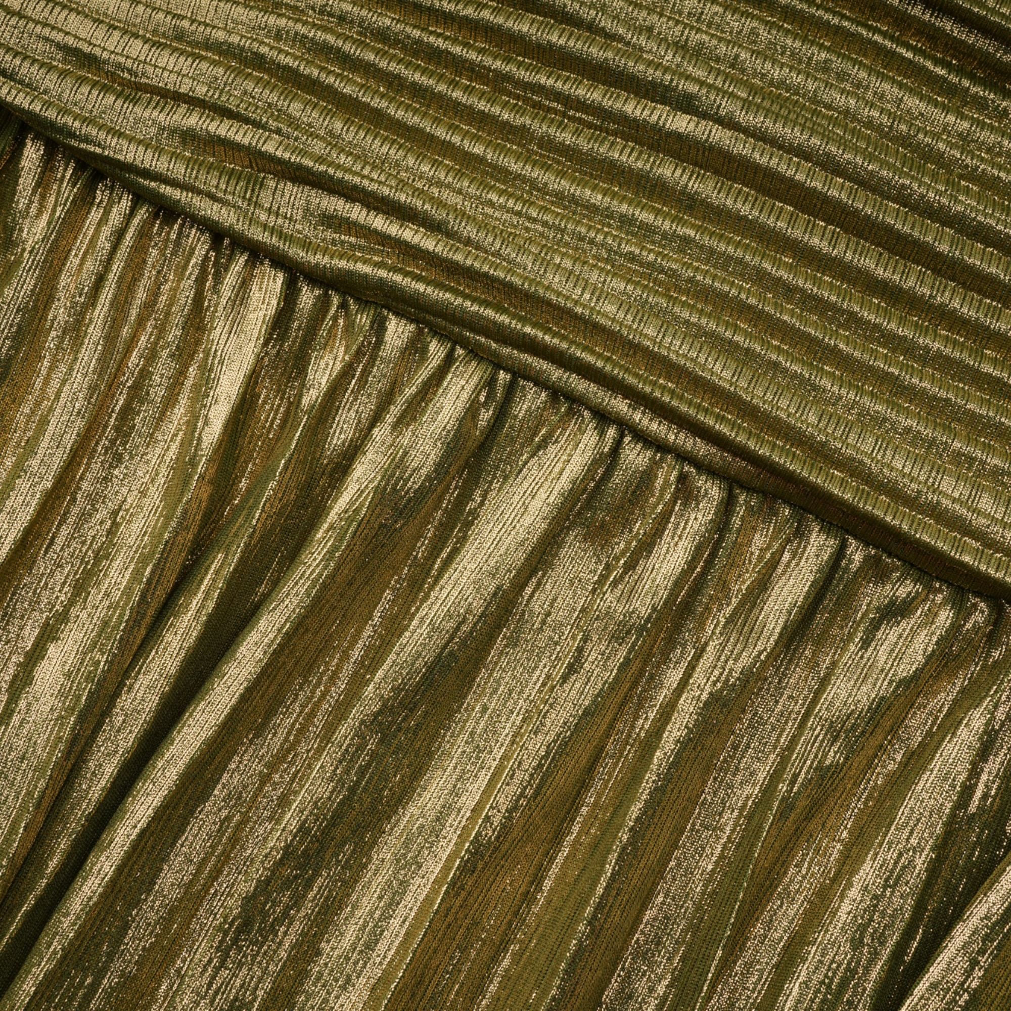 Olive green metallic halter gown with a pleated skirt and high slit