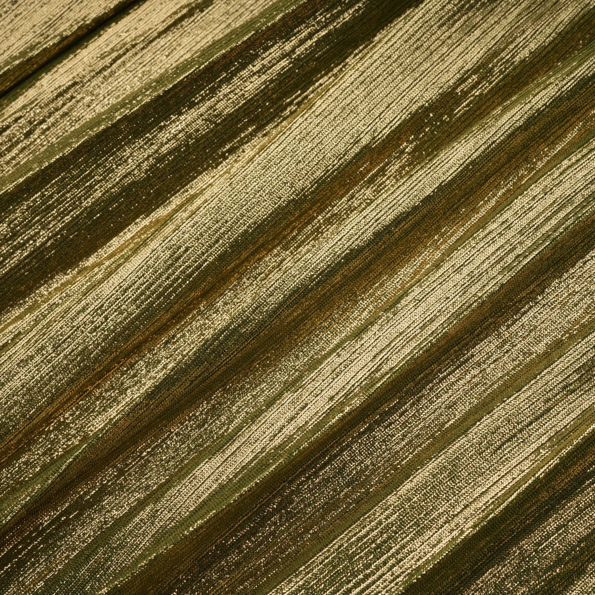 Olive green metallic halter gown with a pleated skirt and high slit