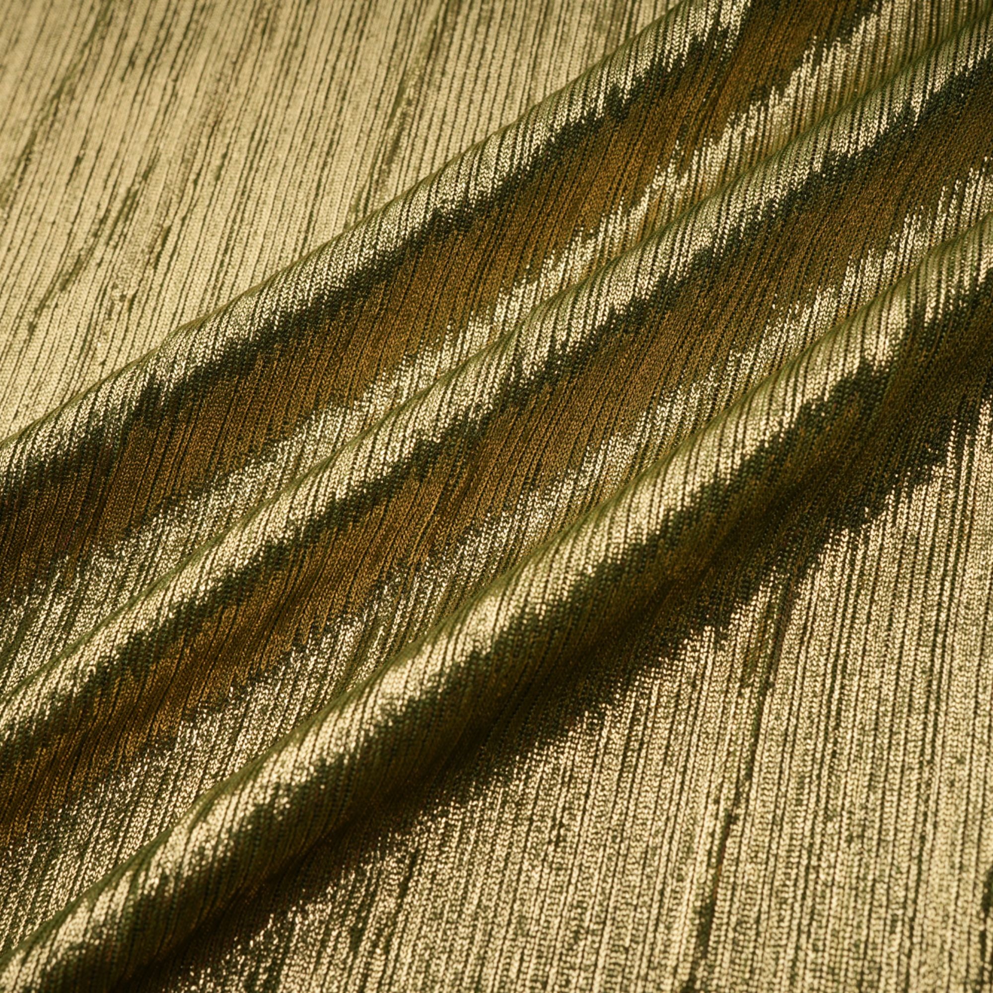 Olive green metallic halter gown with a pleated skirt and high slit