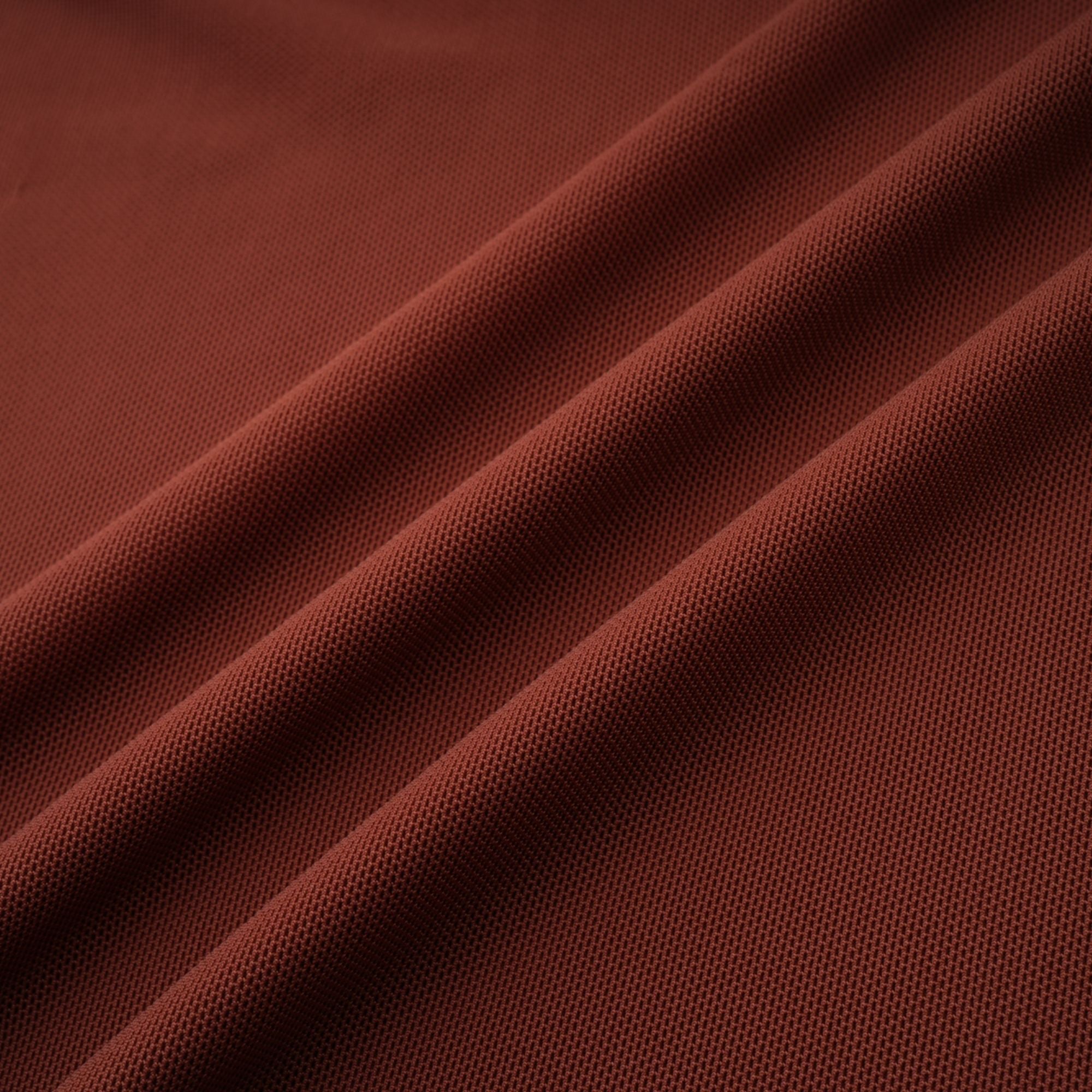 Rust-colored long-sleeve maxi dress with a draped cowl neckline and pleated bodice
