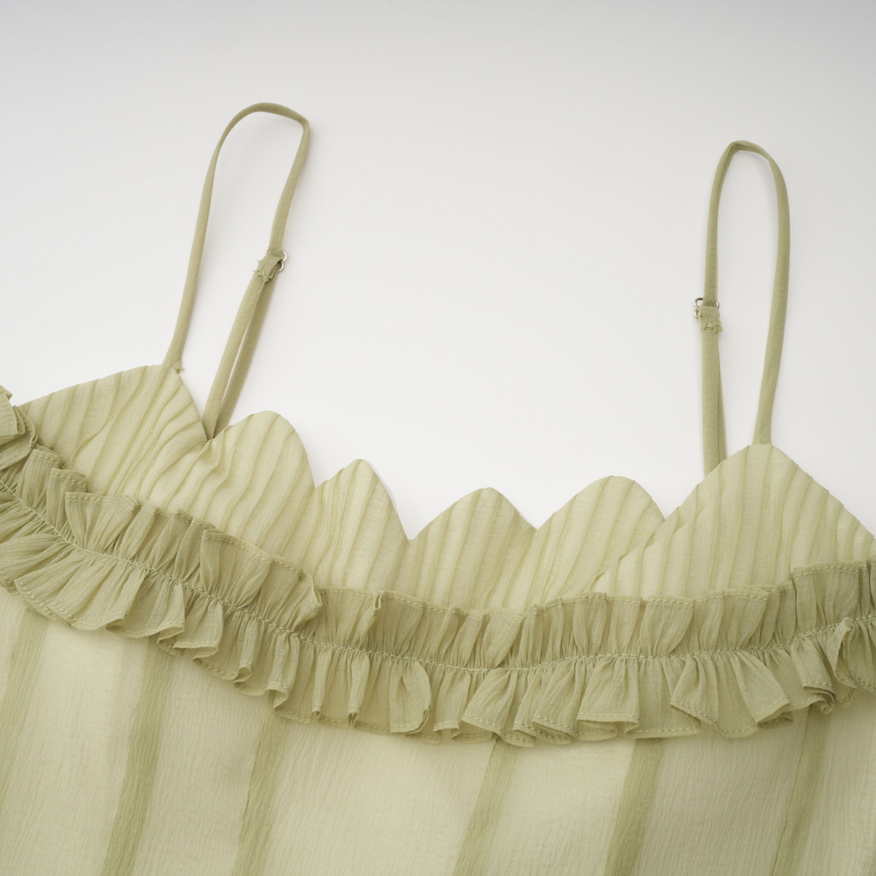 Light green spaghetti strap maxi dress with a ruffled neckline
