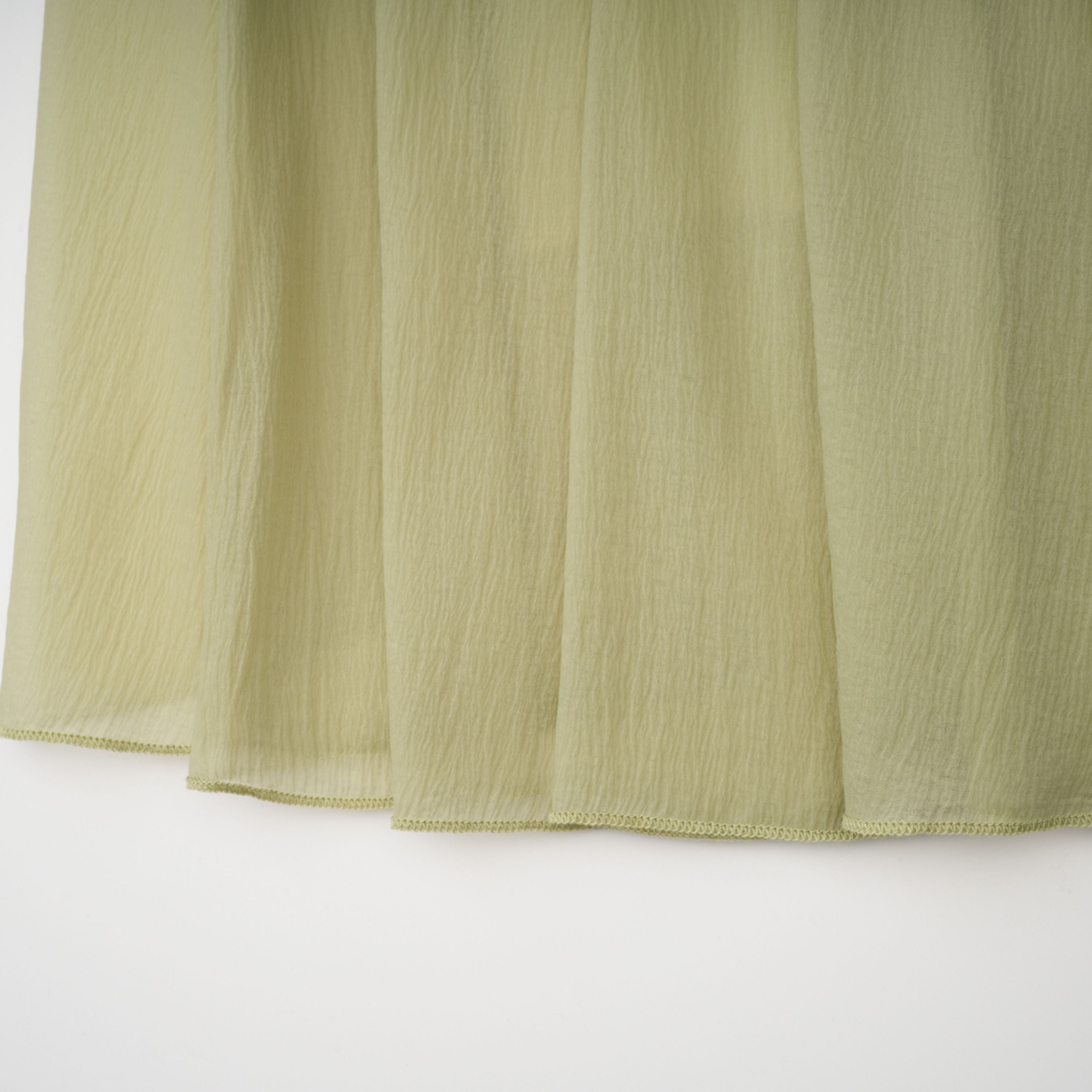 Light green spaghetti strap maxi dress with a ruffled neckline