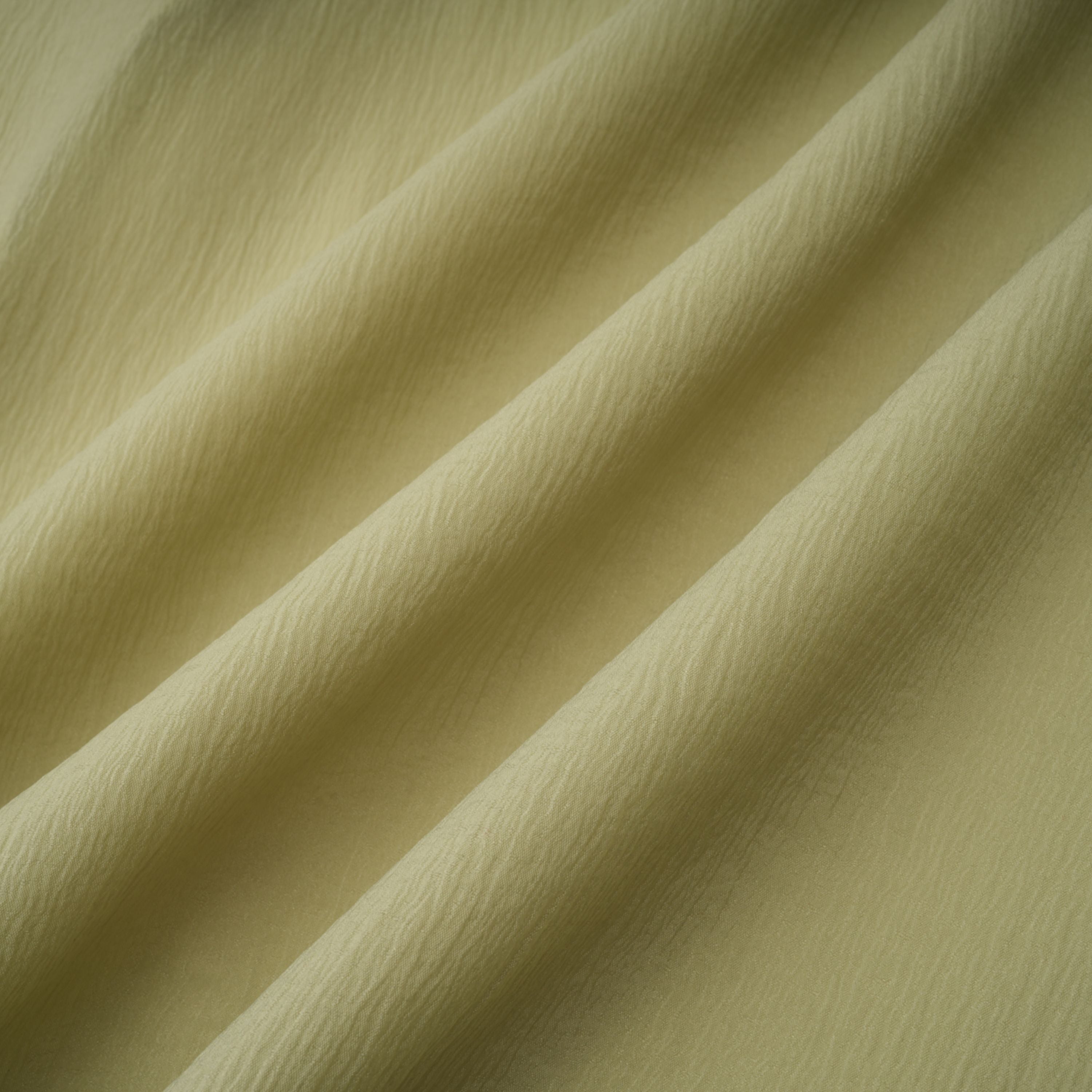 Light green spaghetti strap maxi dress with a ruffled neckline