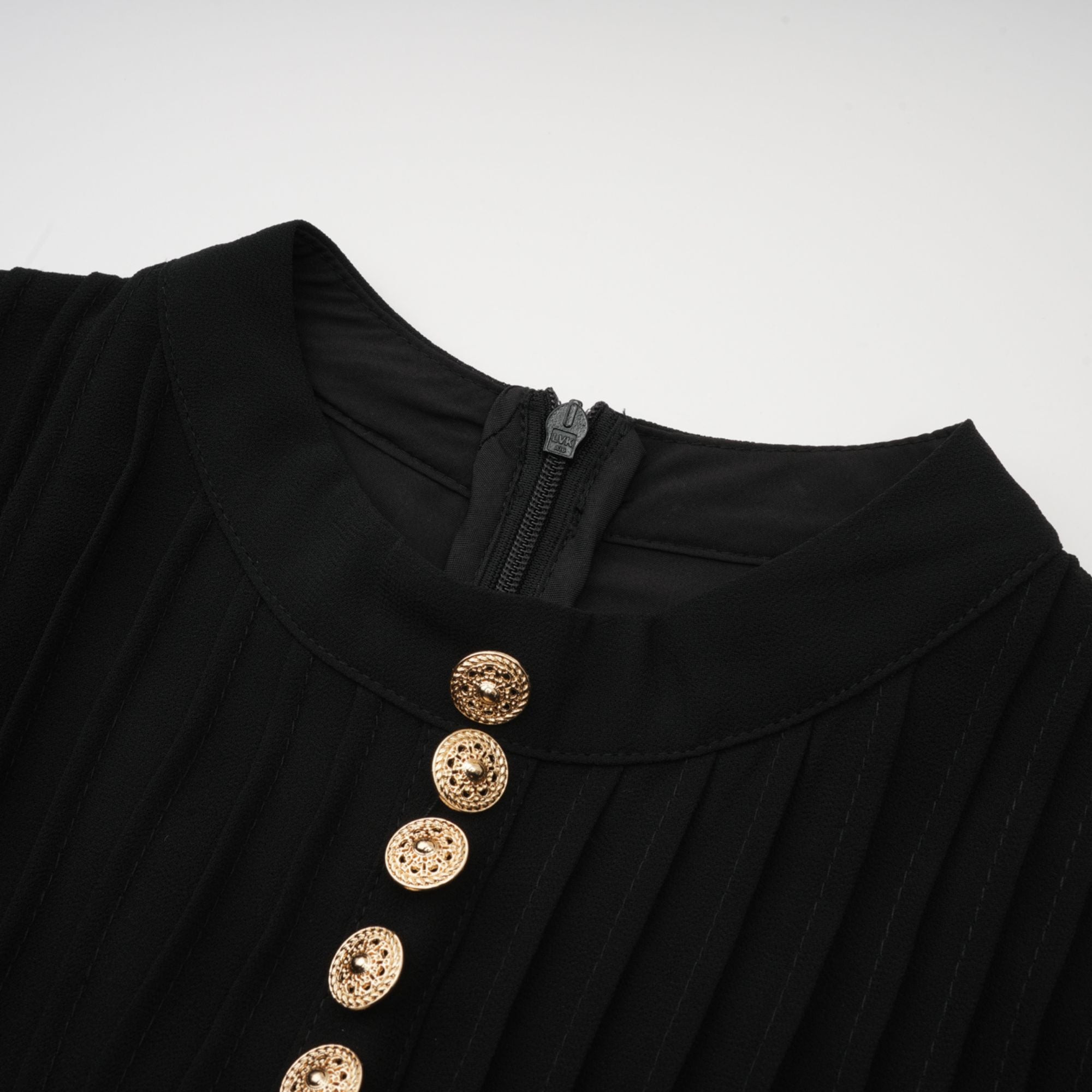 Black pleated midi dress with gold button details