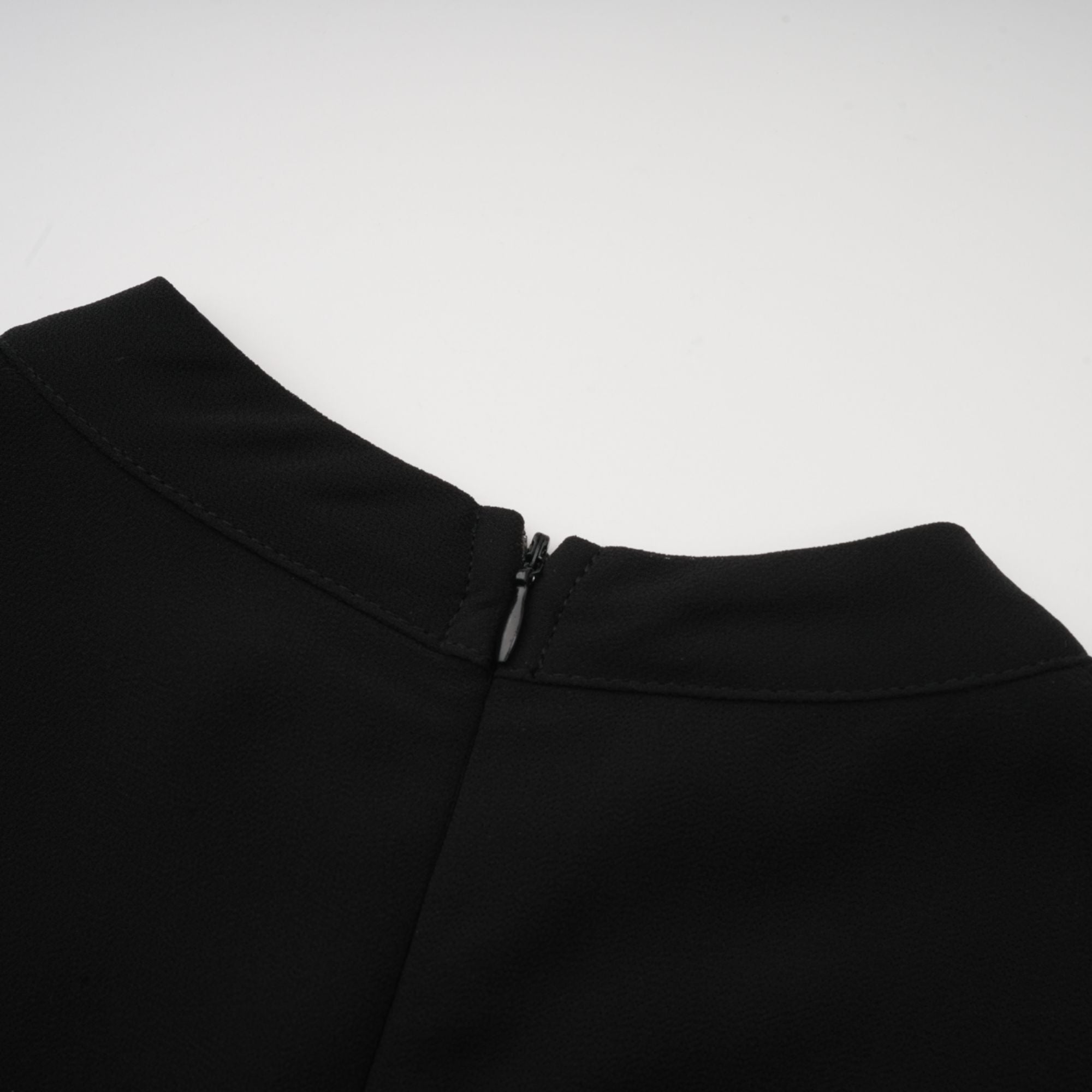 Black pleated midi dress with gold button details