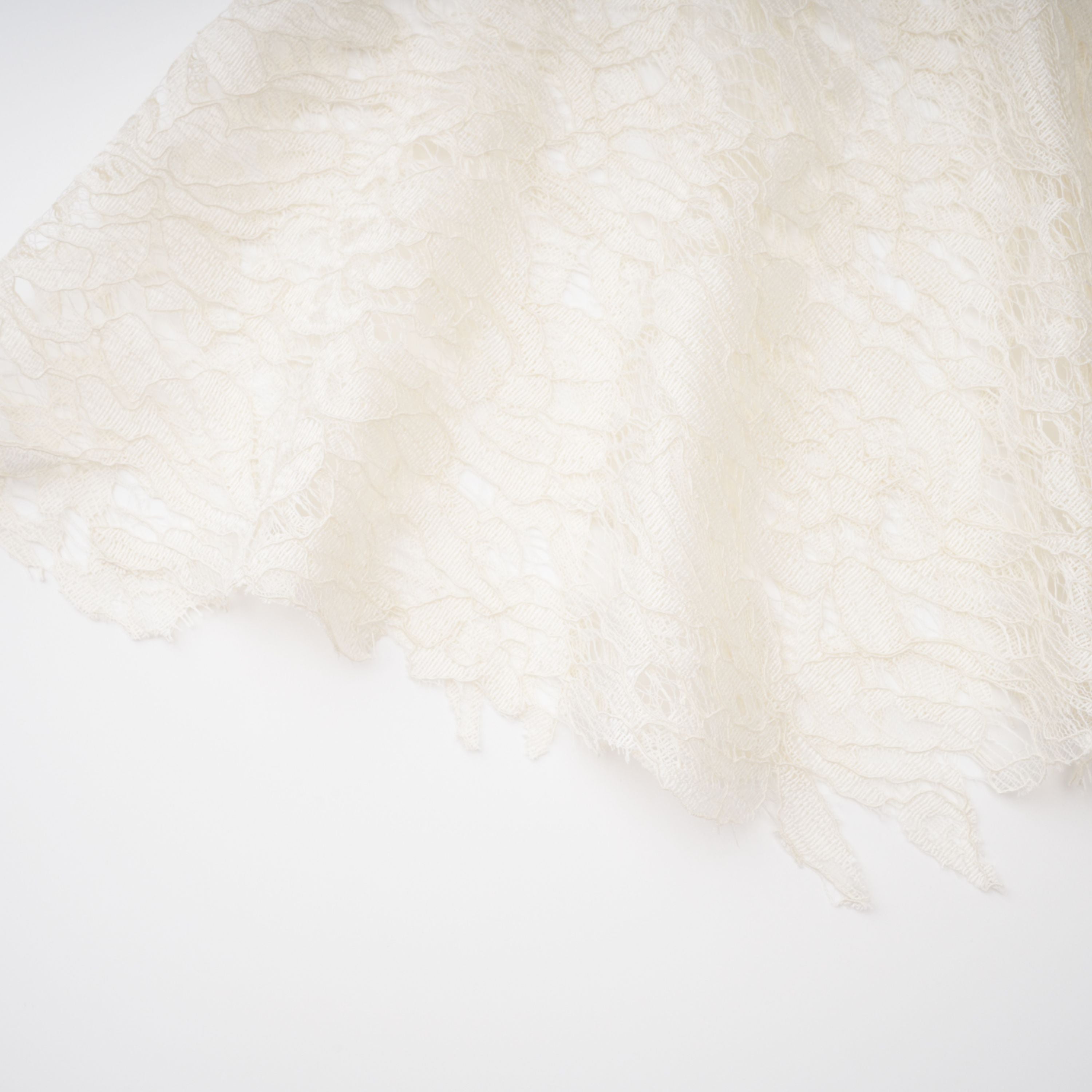 White lace midi dress with a keyhole neckline and a flared skirt over a nude lining